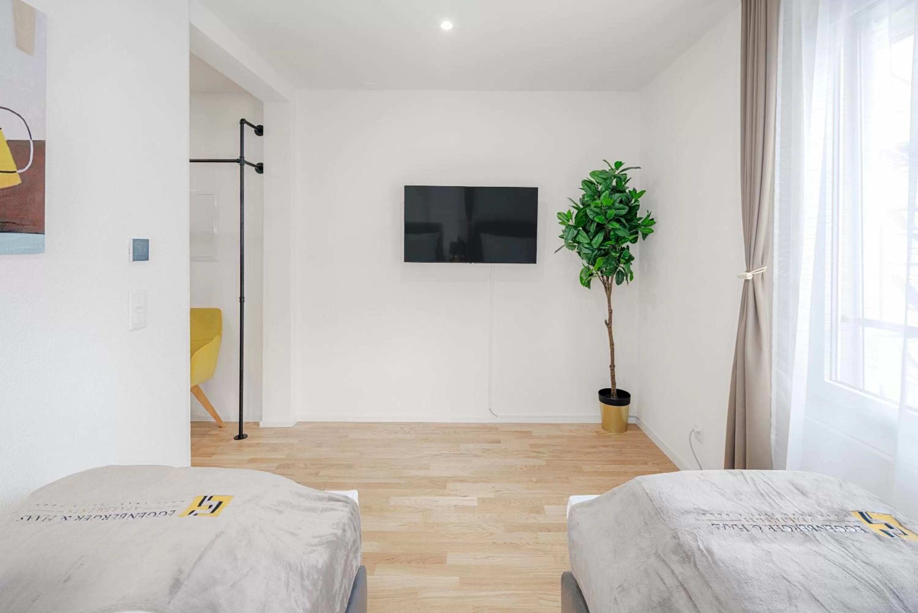 Bed in VISIMO Apartments St Georgen-Strasse St Gallen - Design City Nature