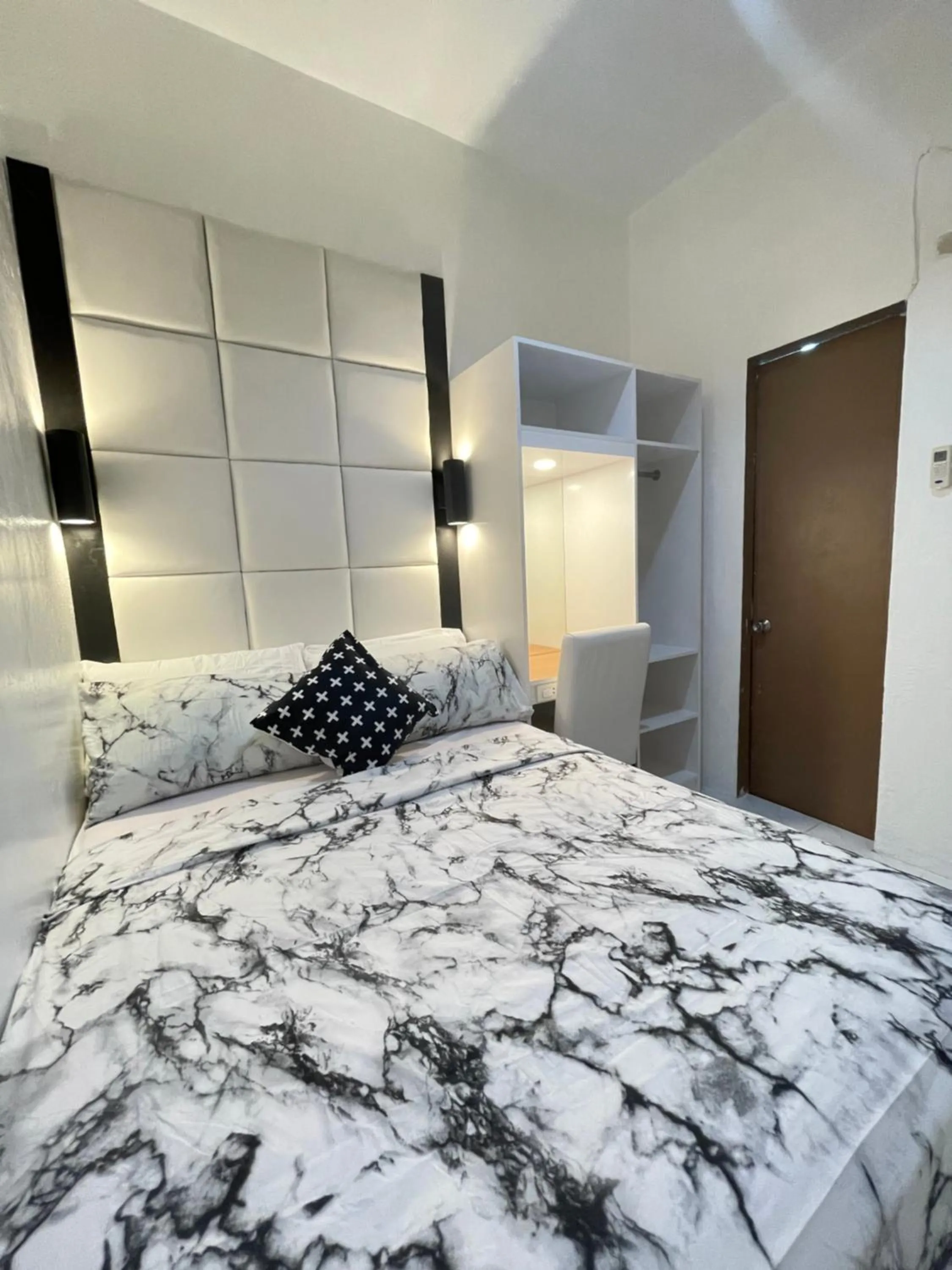 Seating area, Bed in Malapascua Budget Inn MBI DIVE CENTER