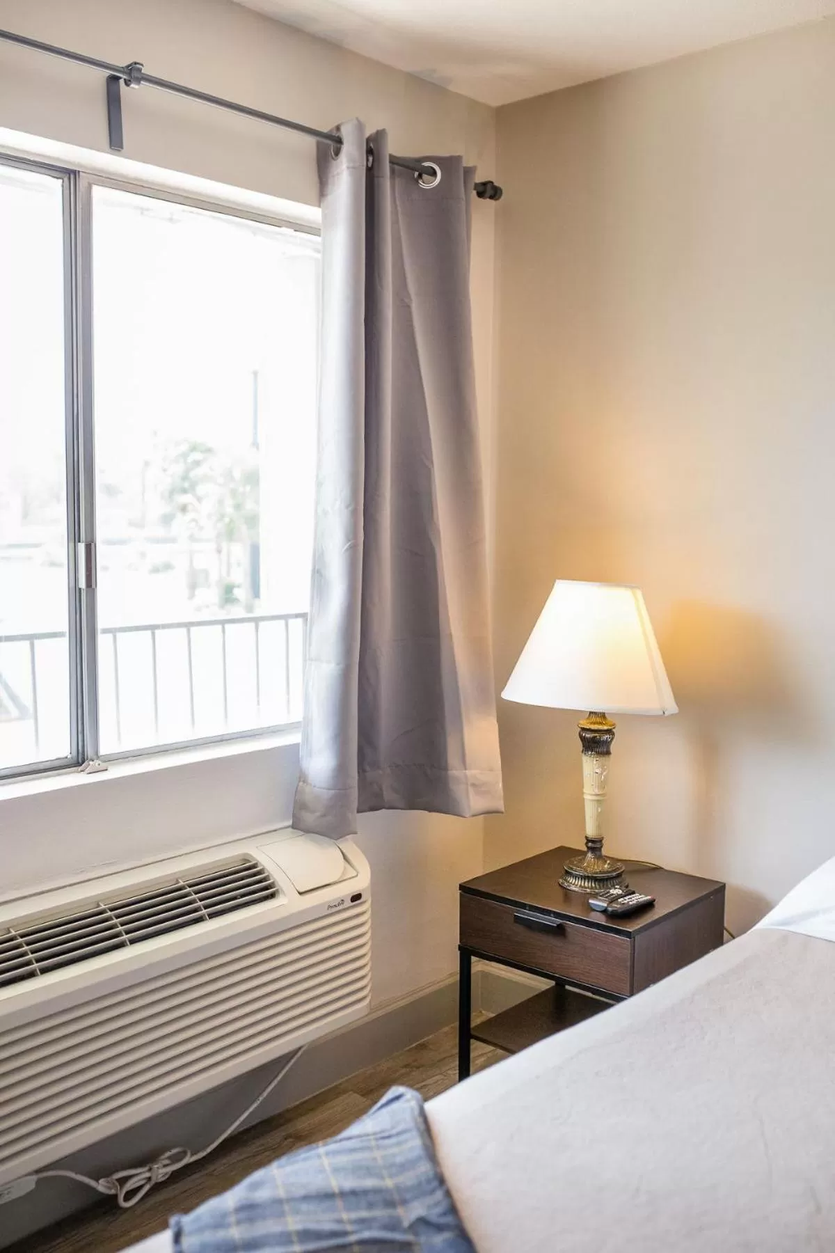 Bed in Merit Inn and Suites