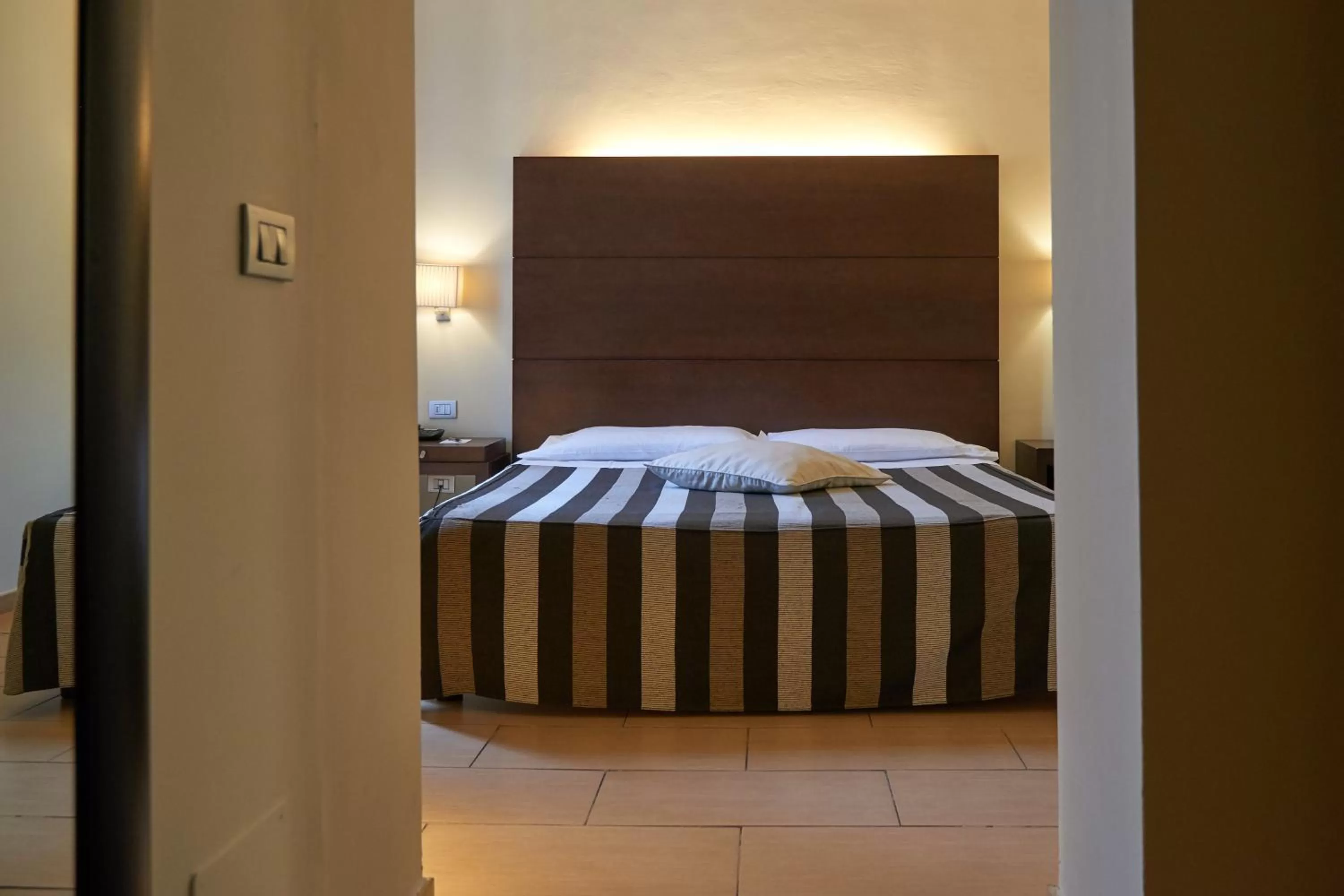 Bed in Hotel Cosimo de' Medici