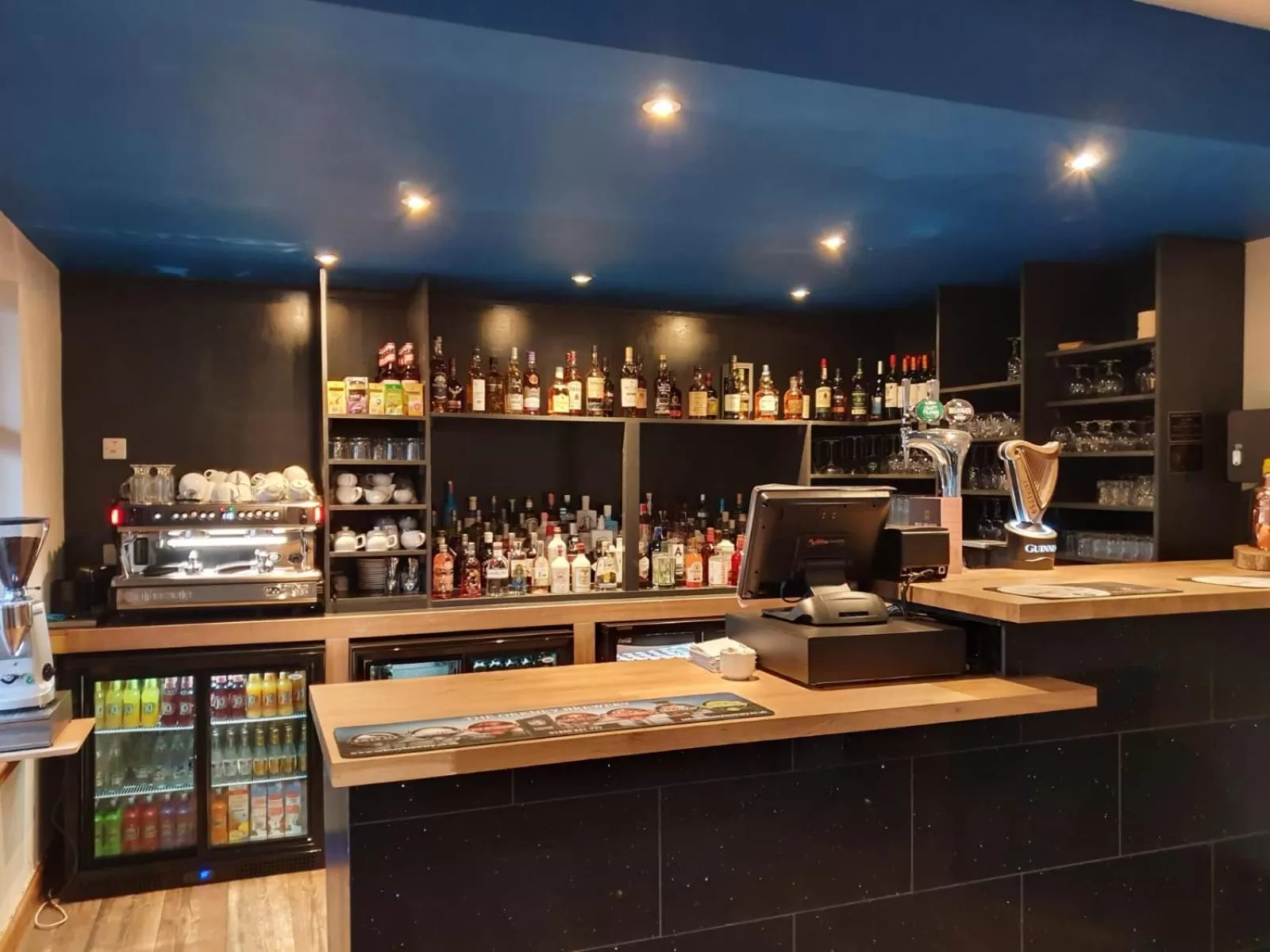 Lounge or bar in West End Hotel