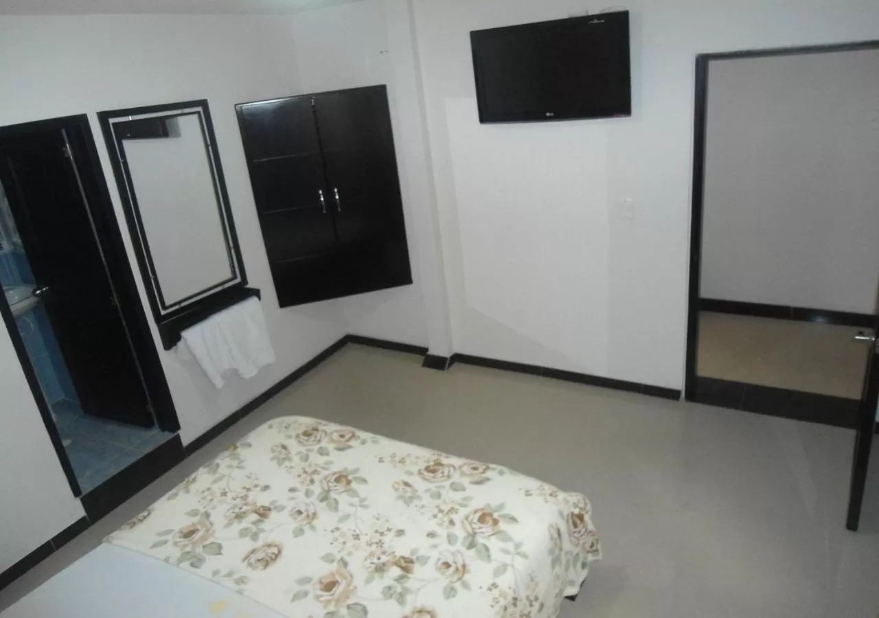 TV/Entertainment Center in Hotel Palmeras De Mariana