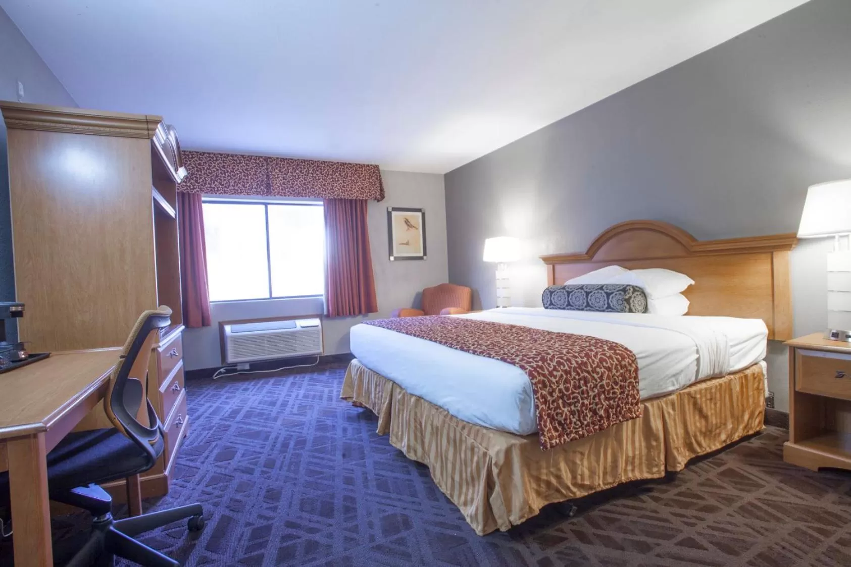 Photo of the whole room, Bed in Ramada by Wyndham Barstow