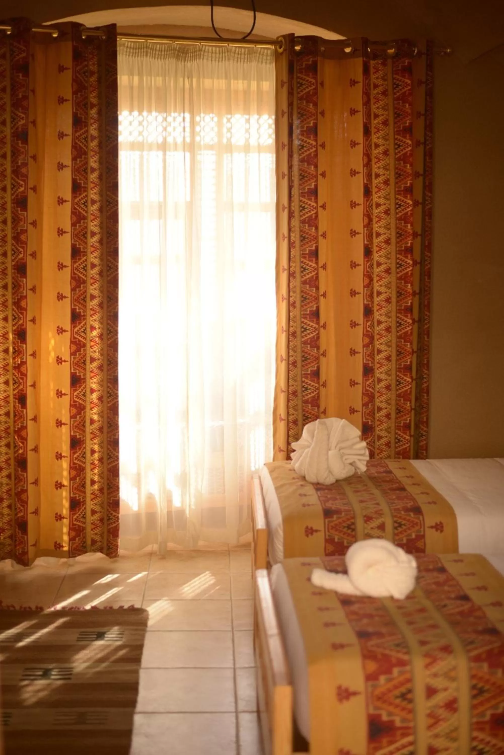 Bed in Embrace Hotel