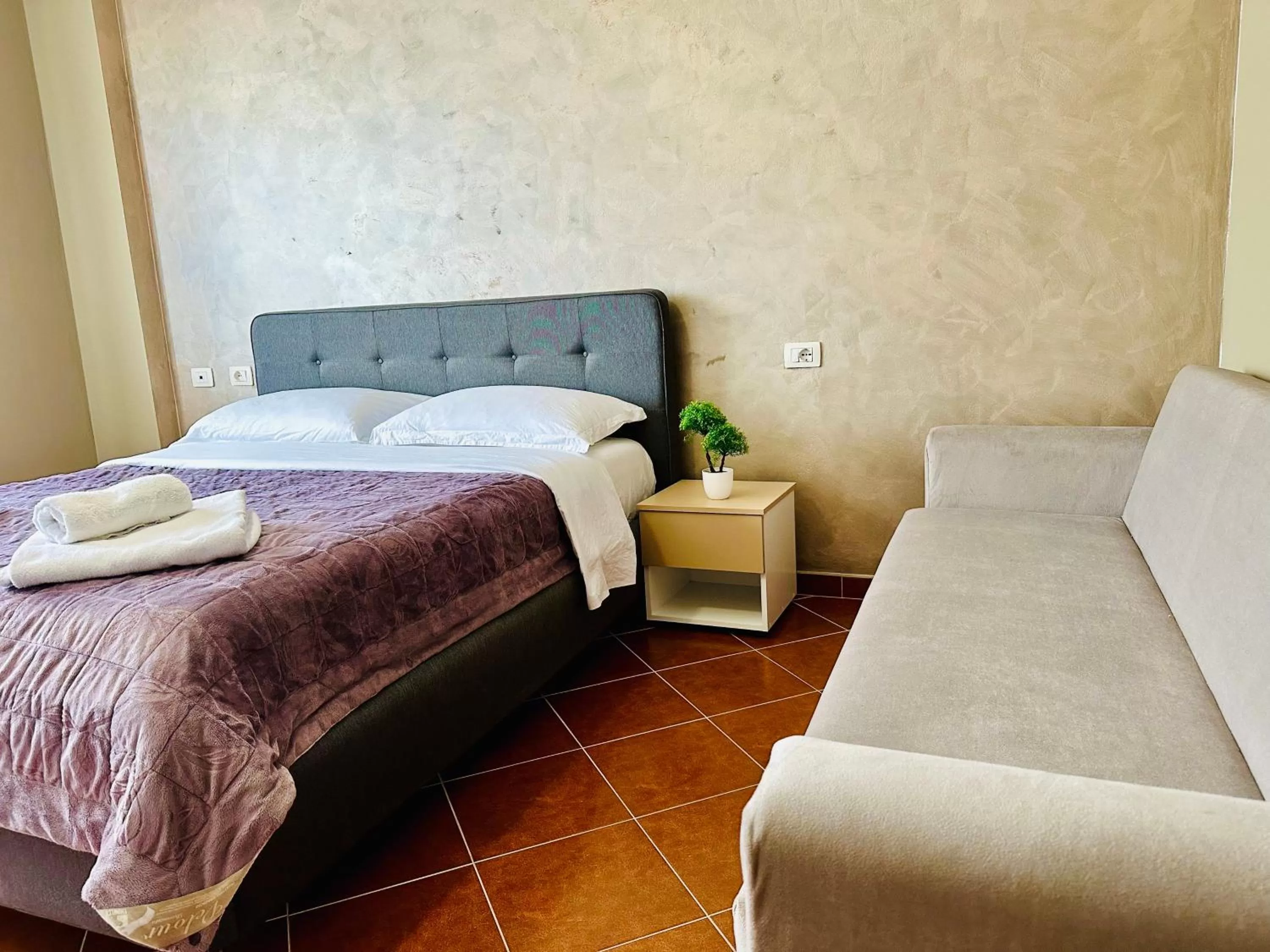 Bed in FAMILY SUITE RESIDENCE