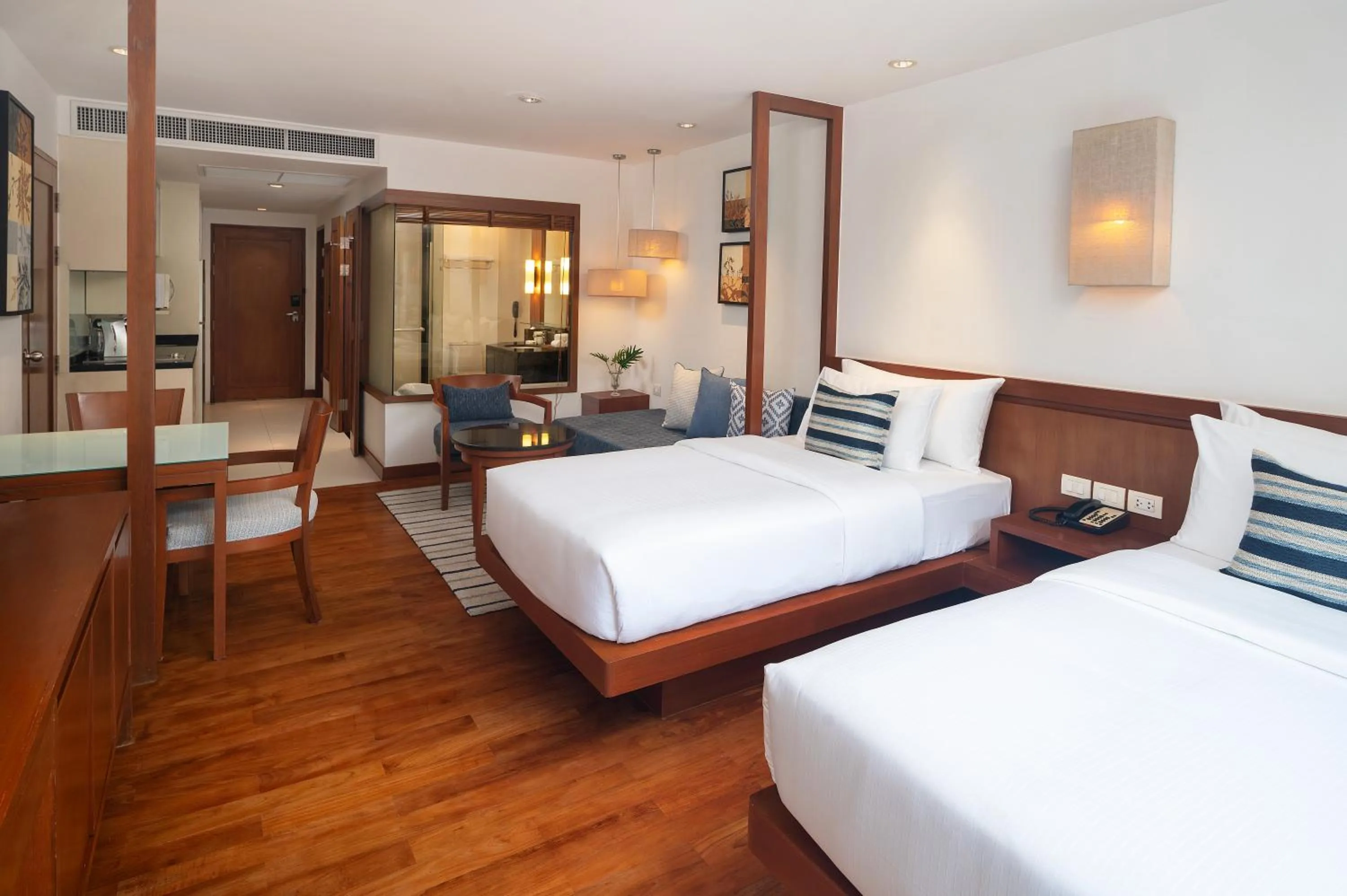 Bed in Woodlands Suites Serviced Residences