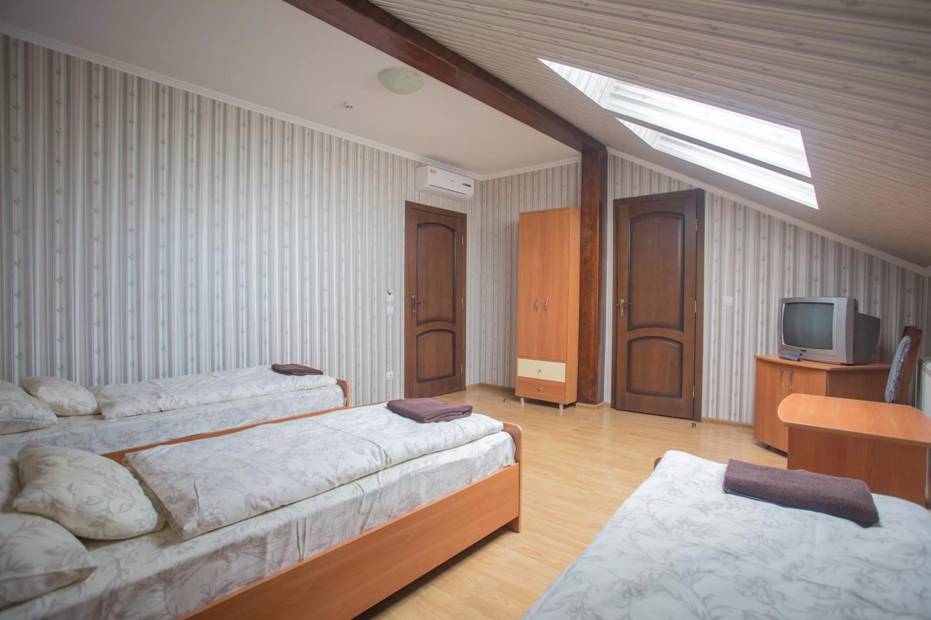 Photo of the whole room, Bed in Praktik Hotel & Restaurant