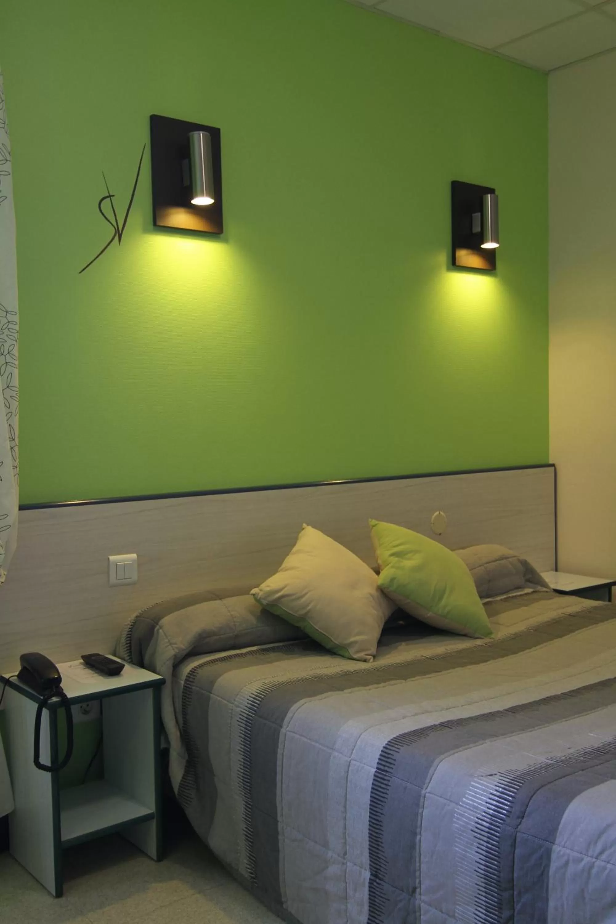 Photo of the whole room, Bed in Hotel Le Saint Vincent Lyon Sud