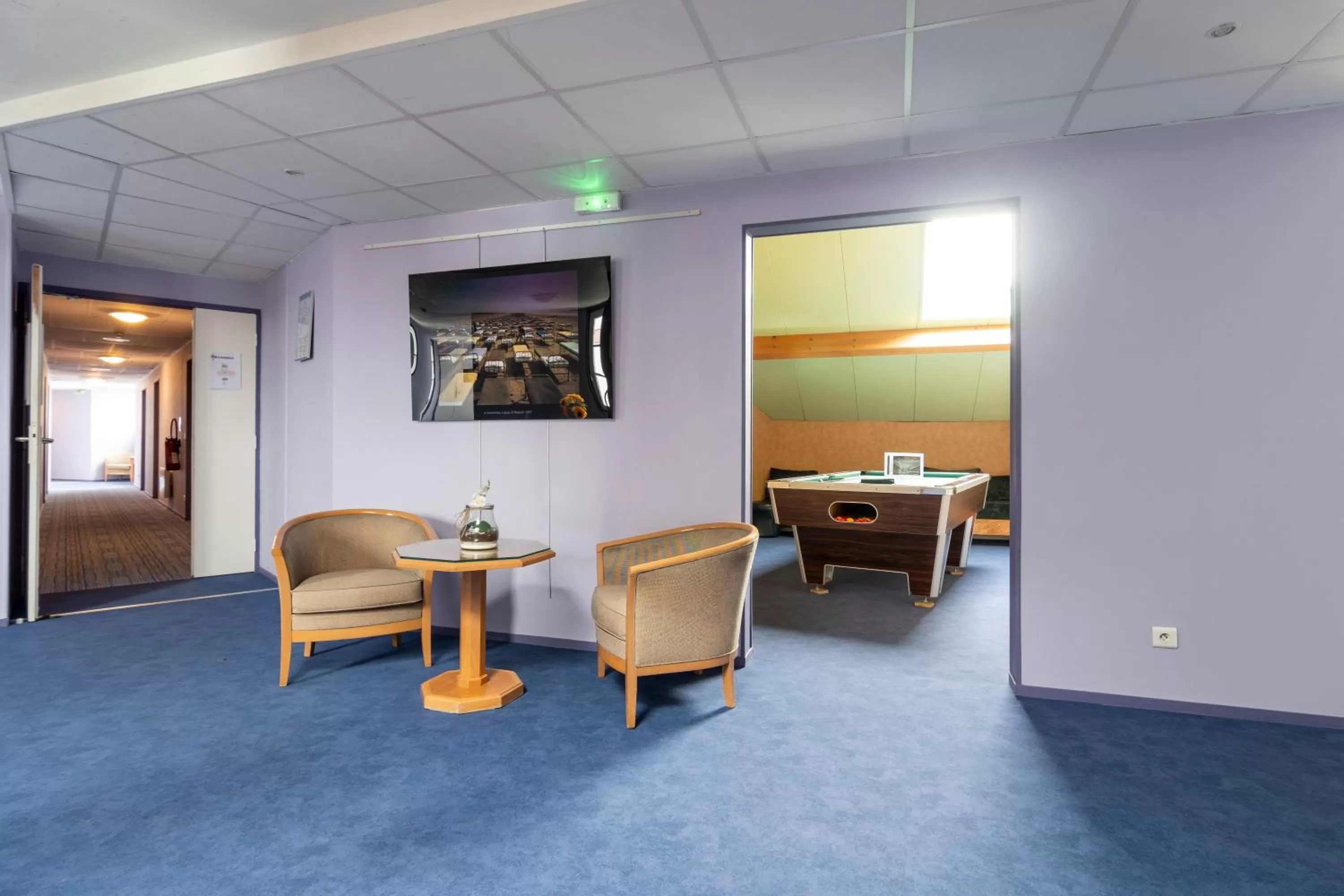 Seating area in Fasthotel Chateauroux