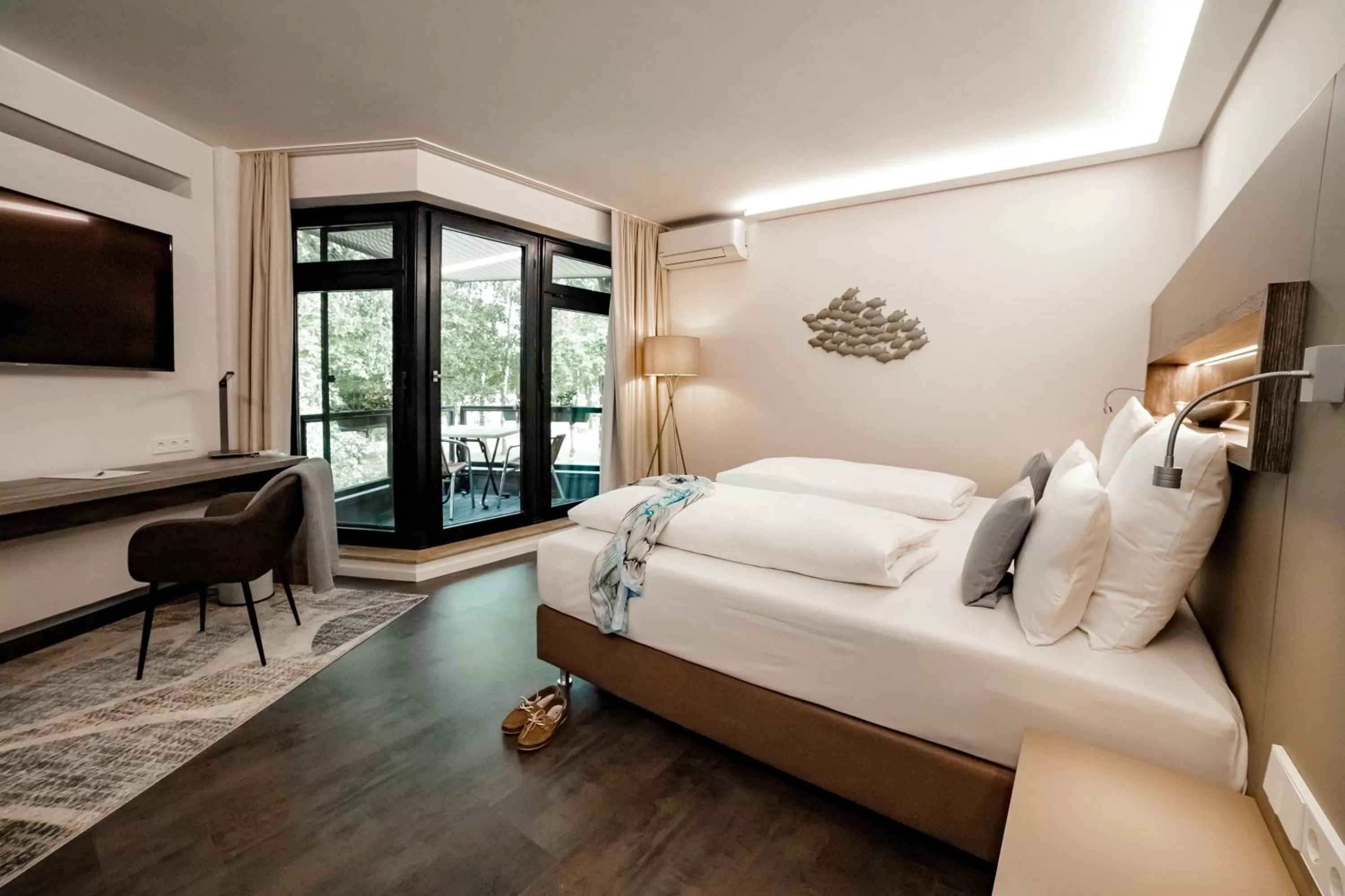 Photo of the whole room, Bed in Seehotel am Tankumsee