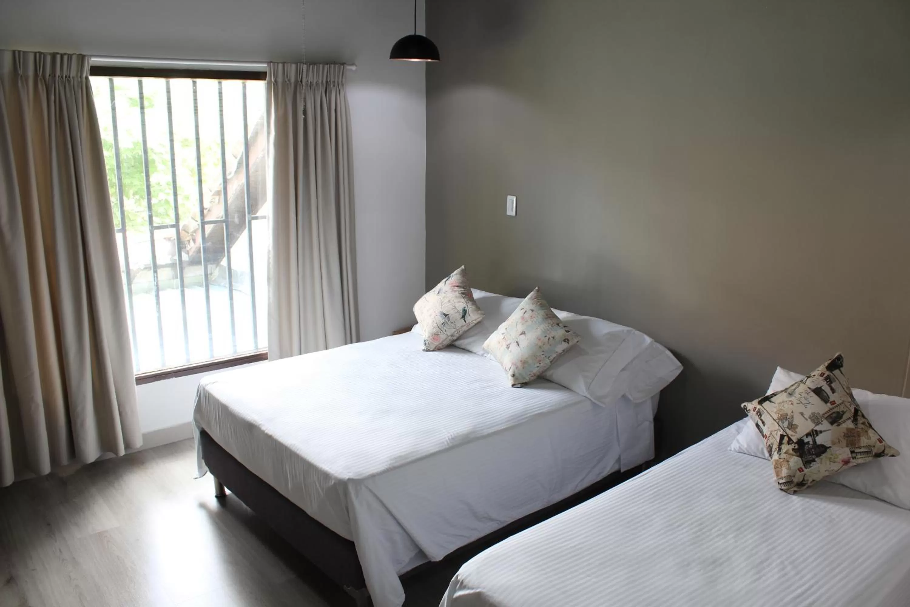 Bed in Hotel Boutique Plaza