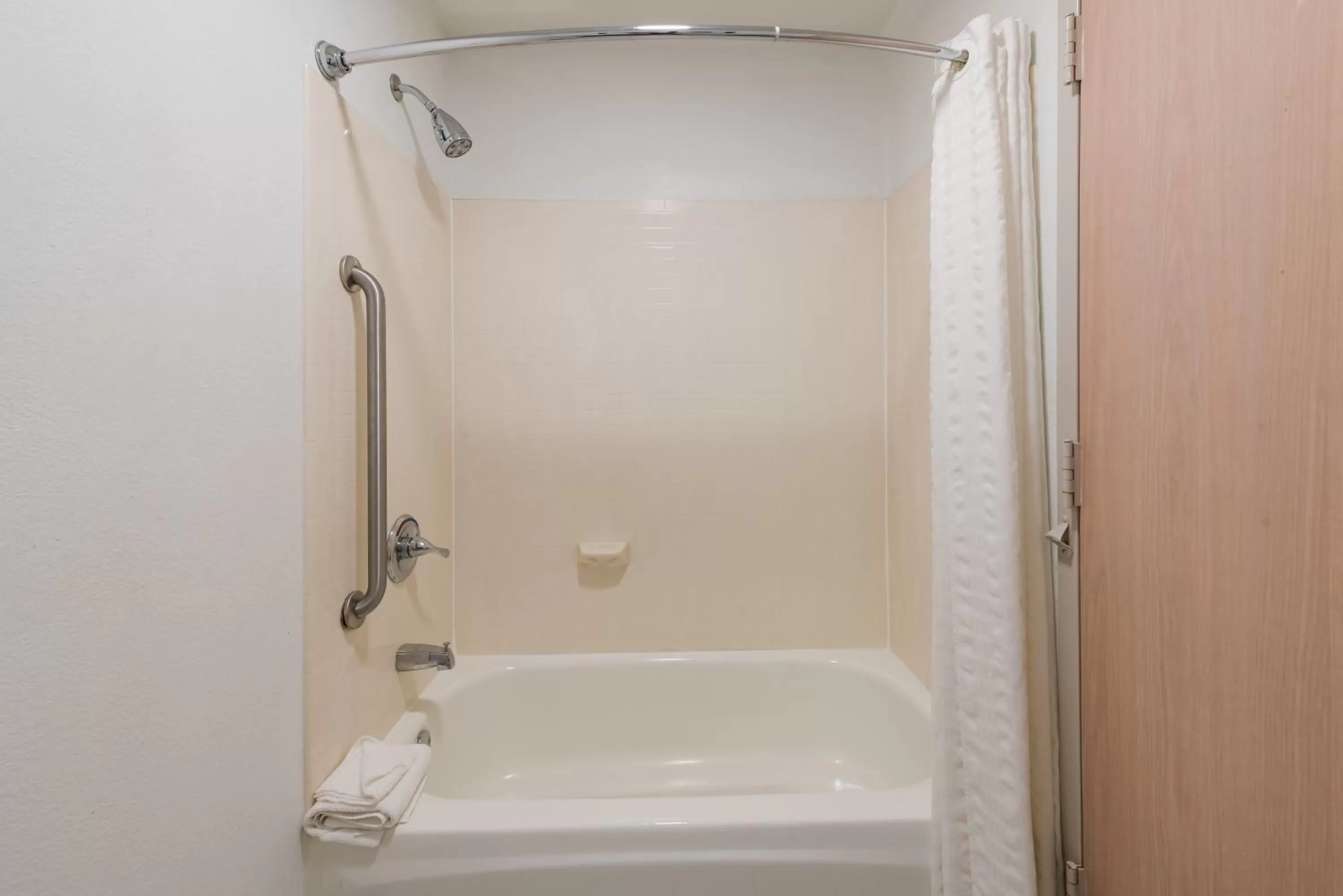 Shower in Country Inn & Suites by Radisson, Wichita East, KS