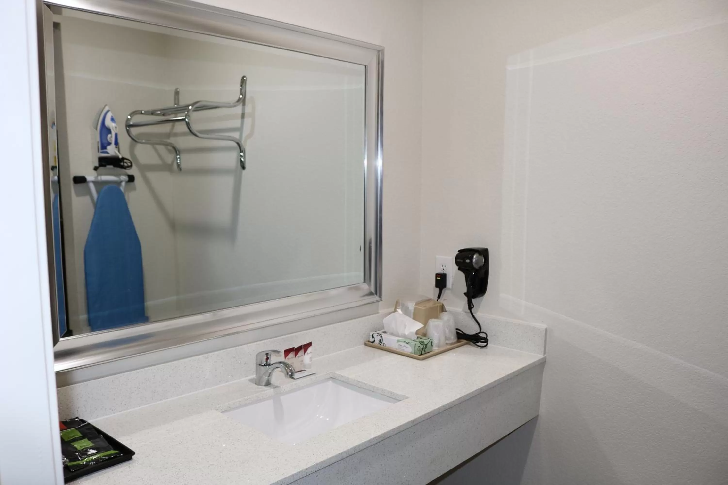 Bathroom in Scottish Inn & Suites - IAH Airport