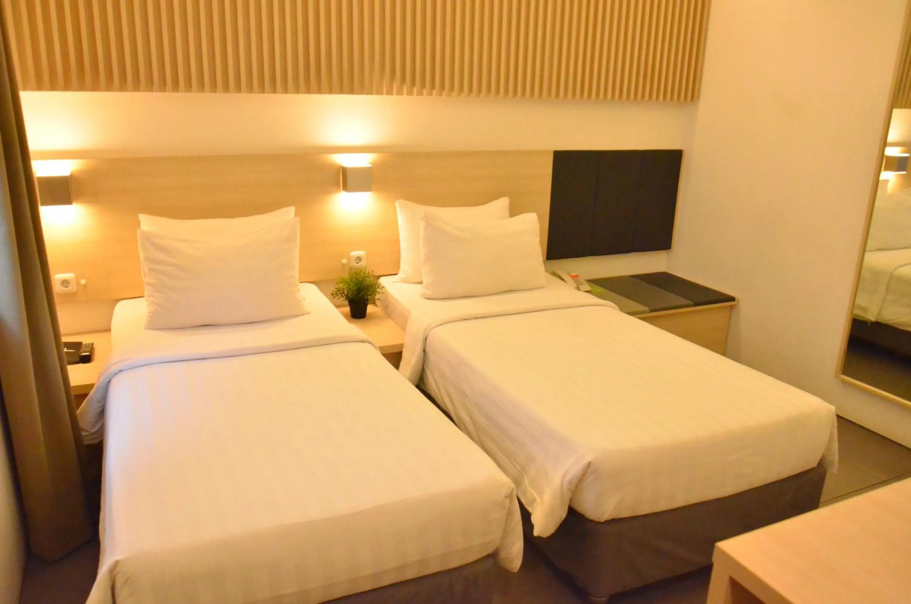 Bed in Malaka Hotel Bandung