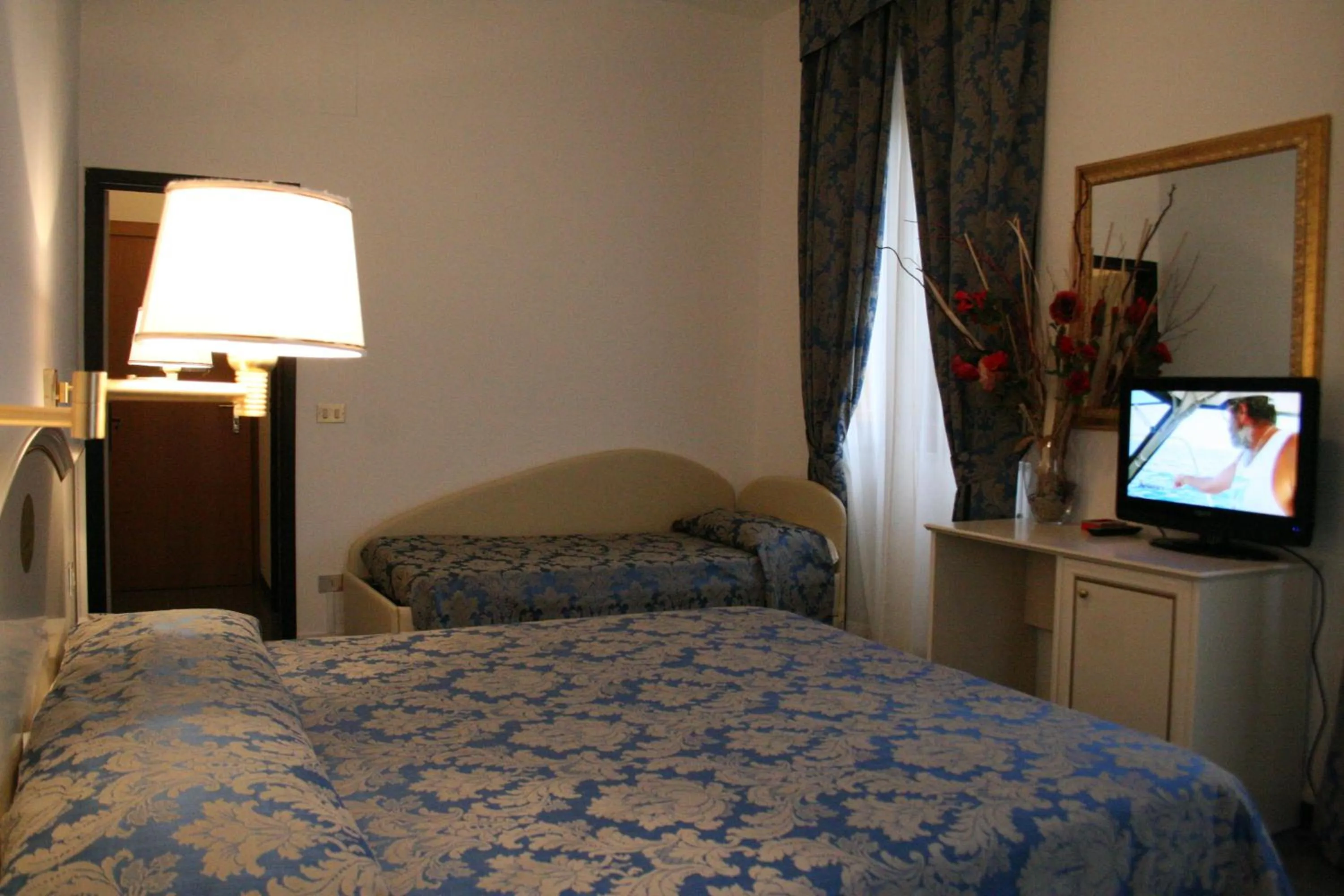 Bed in Hotel La Meridiana
