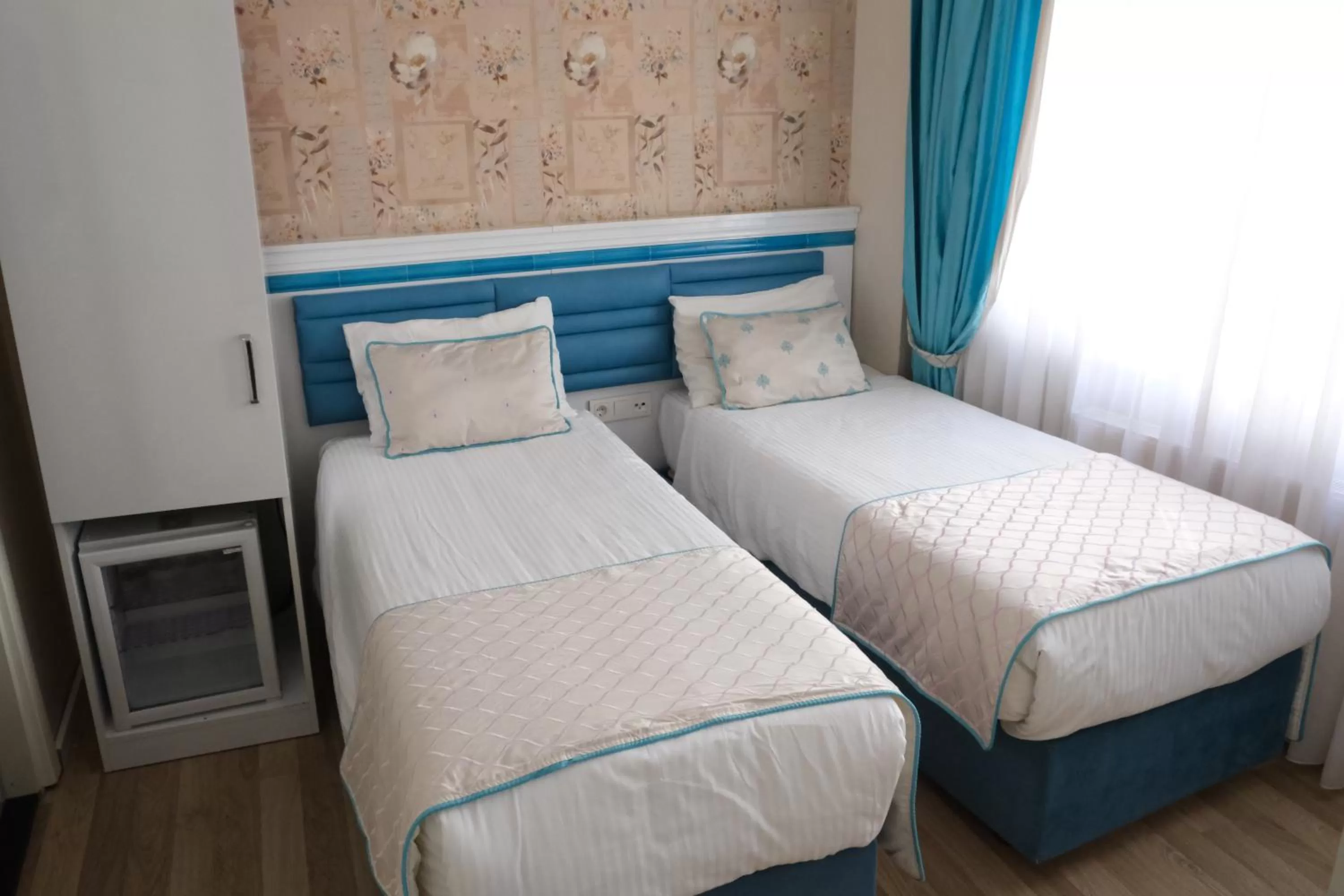 Bed in Star Holiday Hotel