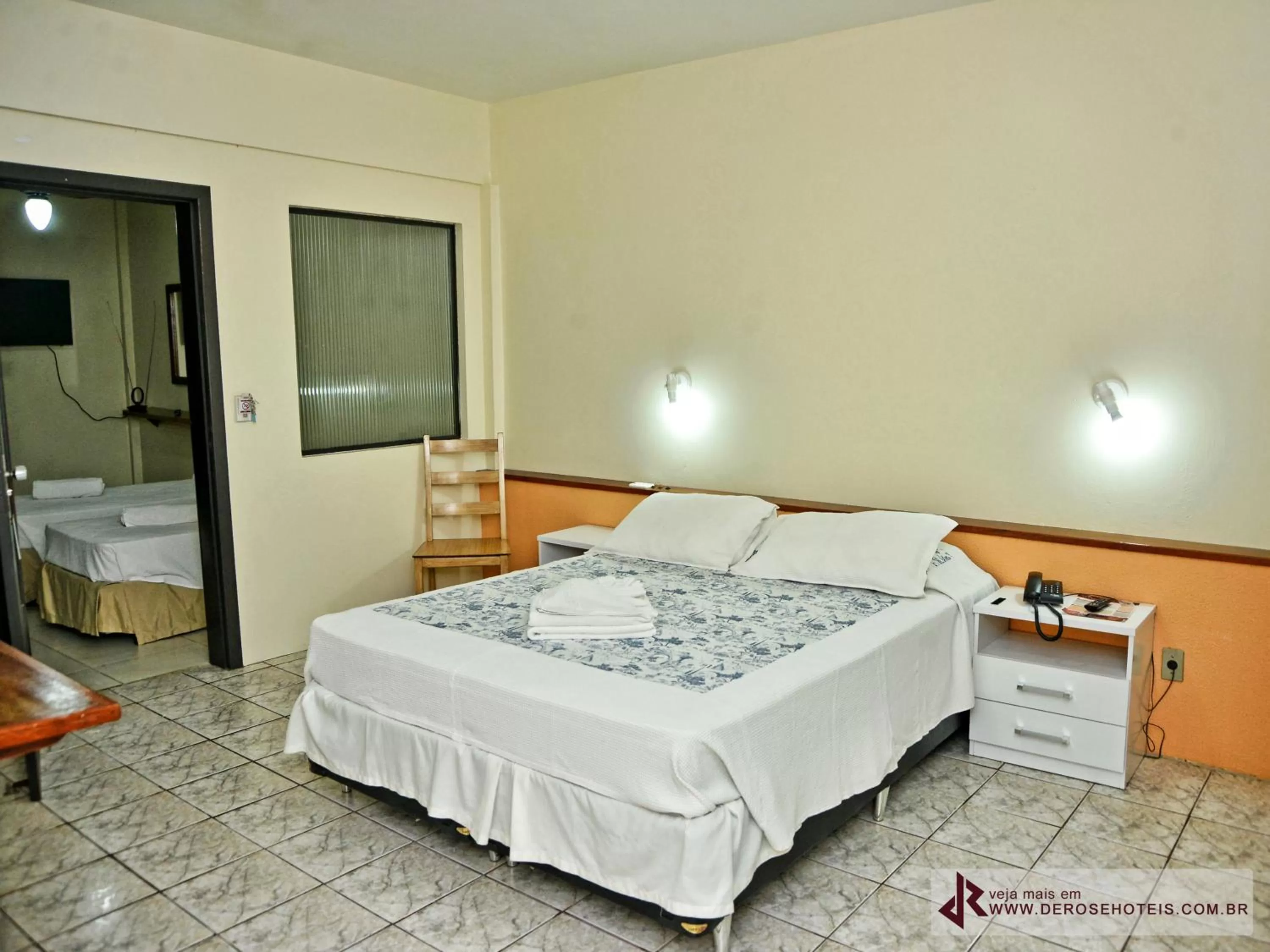 Bed in De Rose Palace Hotel