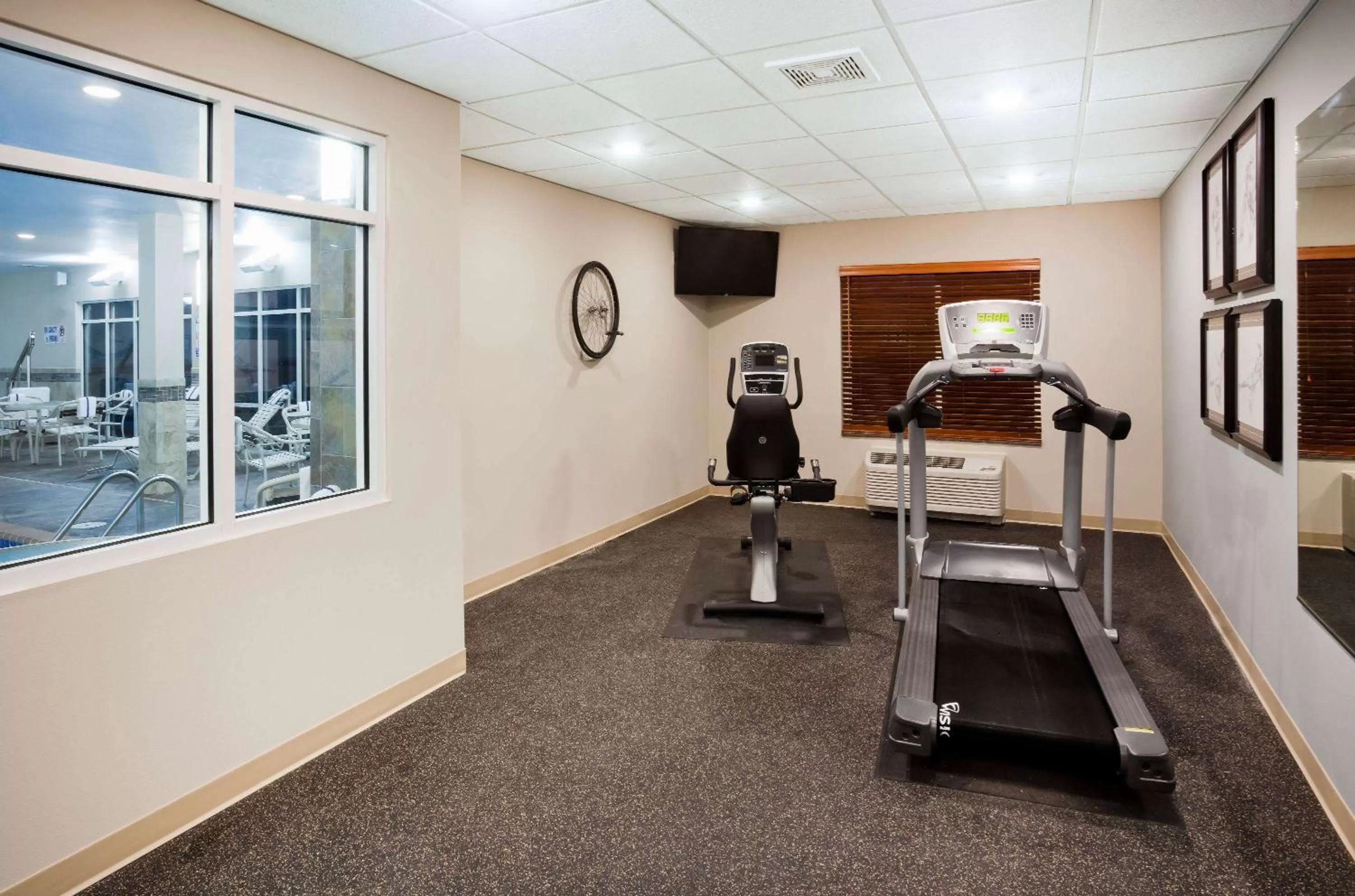 Fitness centre/facilities in AmericInn by Wyndham DeWitt