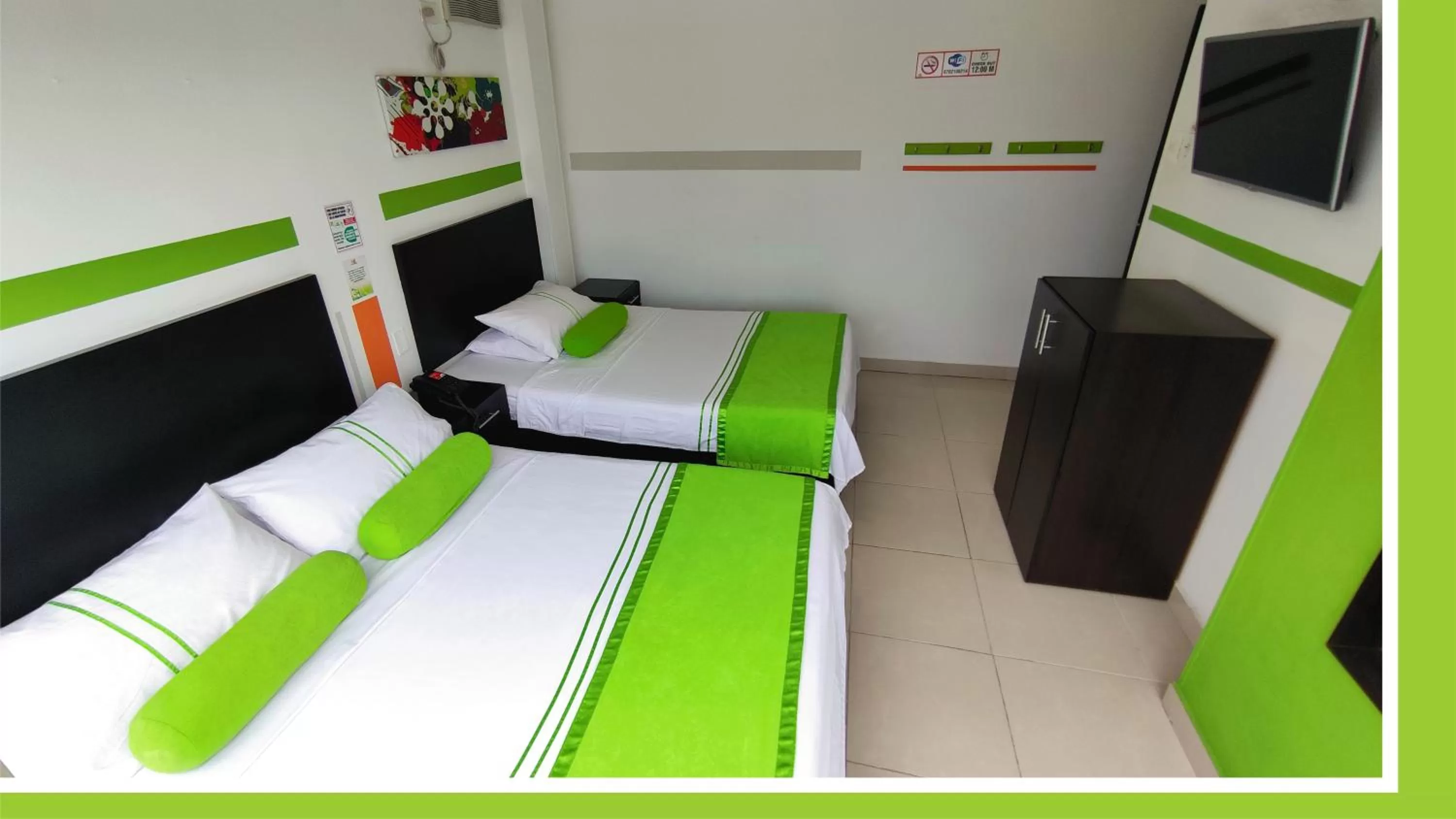 Bed in HOTEL COLOURS Cali