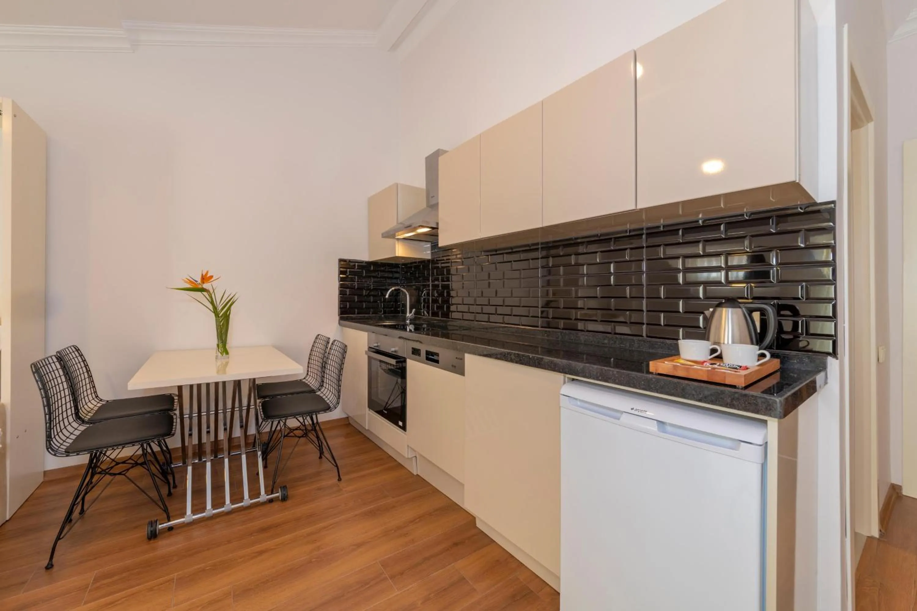 Kitchen or kitchenette in Joy Suites