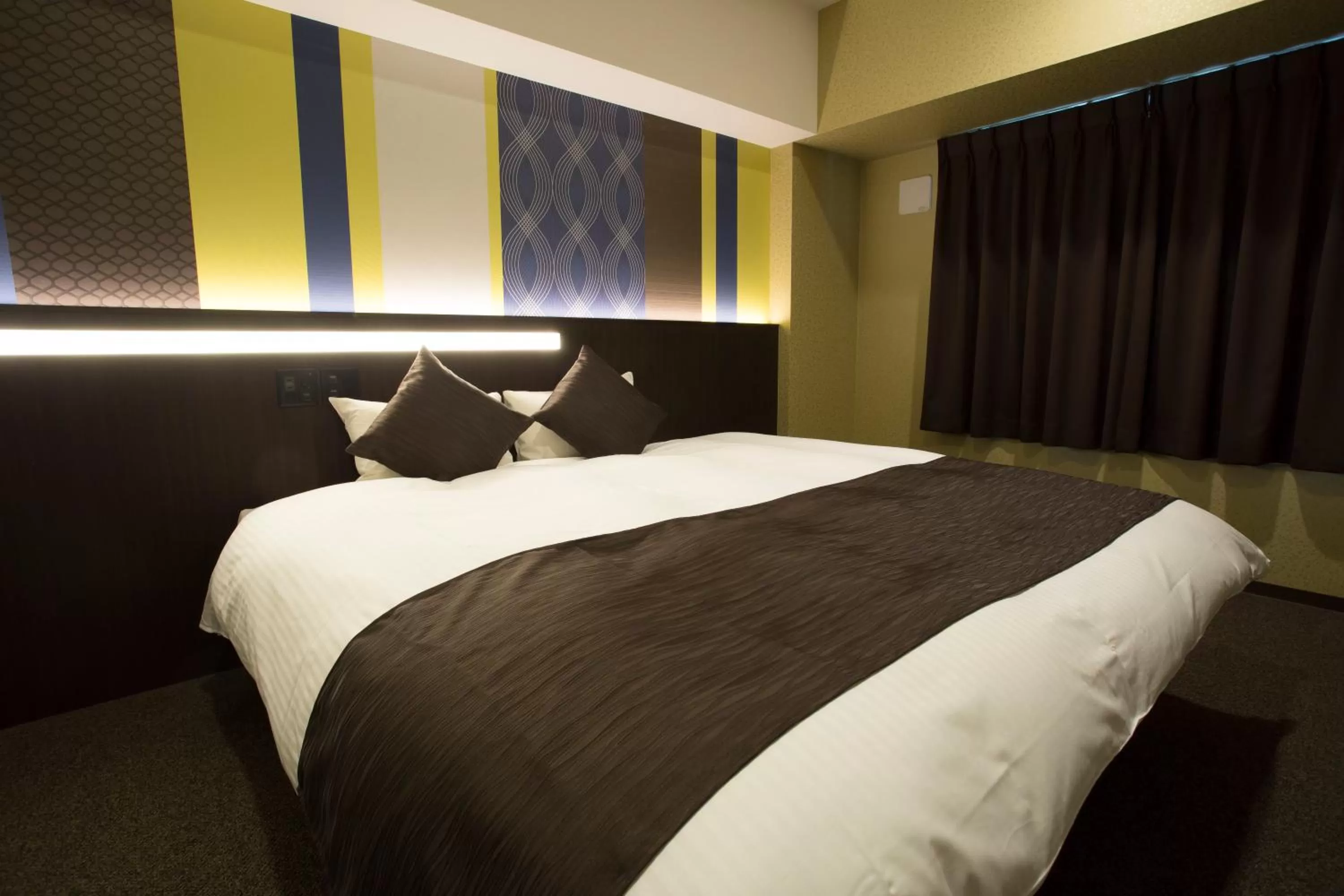 Bed in Lantana Osaka