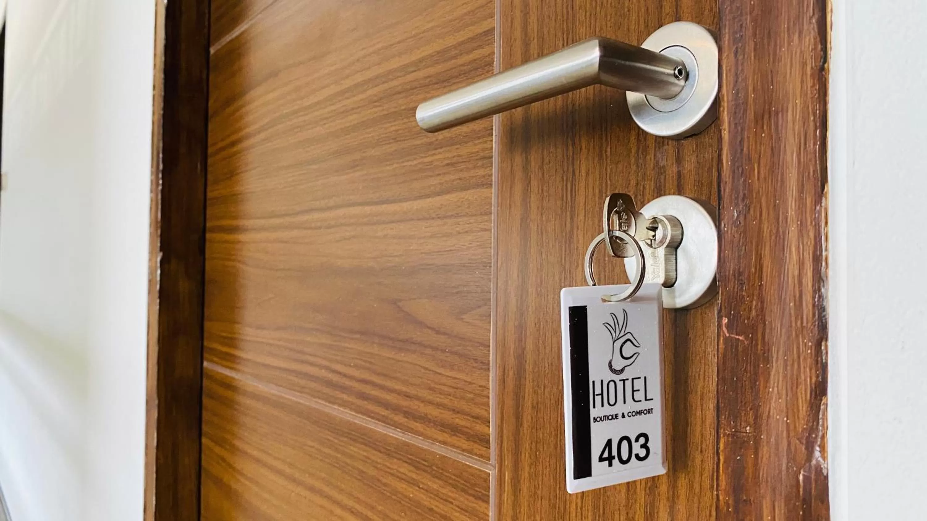 Property logo or sign in C Hotel Boutique and Comfort