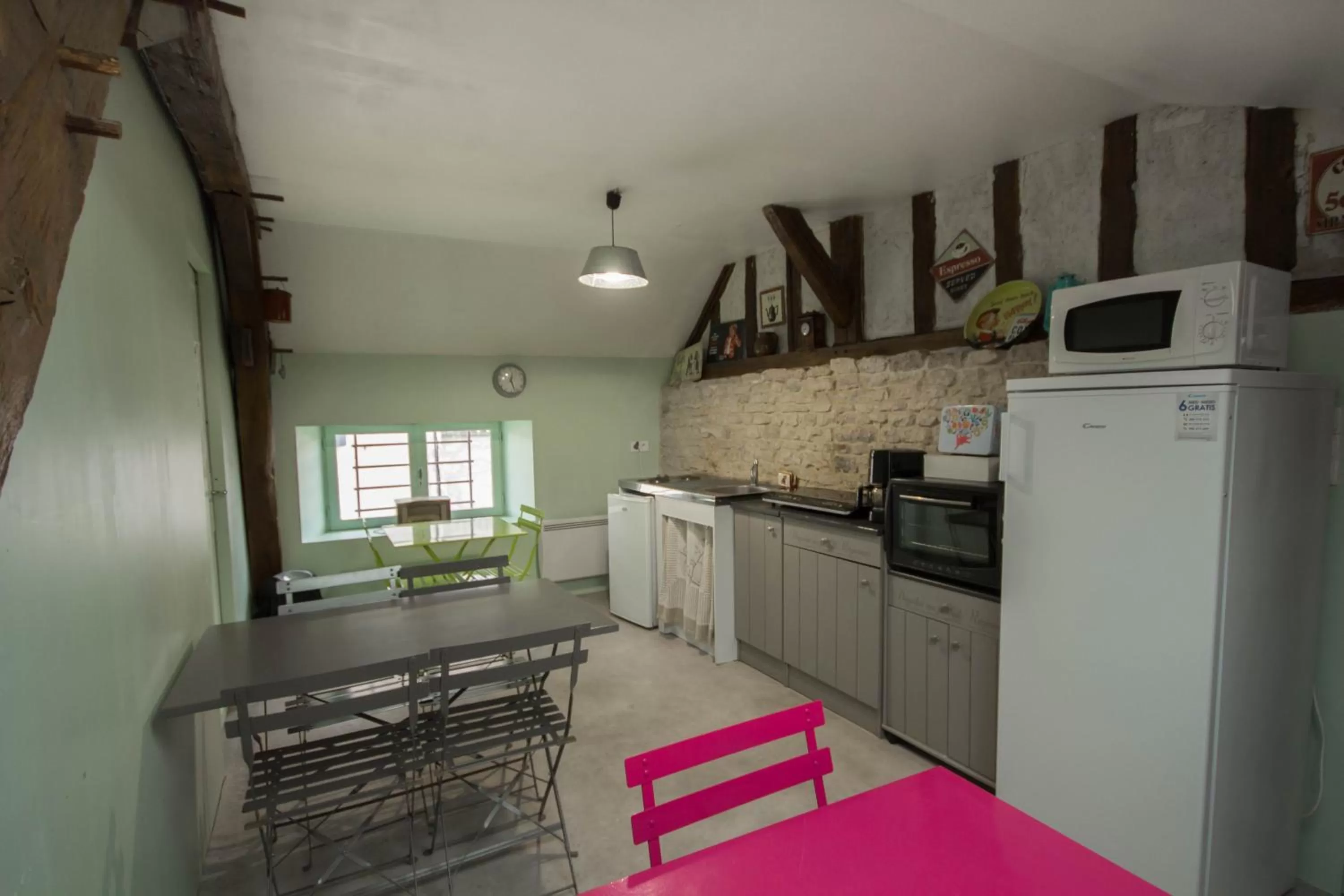 Kitchen or kitchenette in Les chambres touristique Juléa