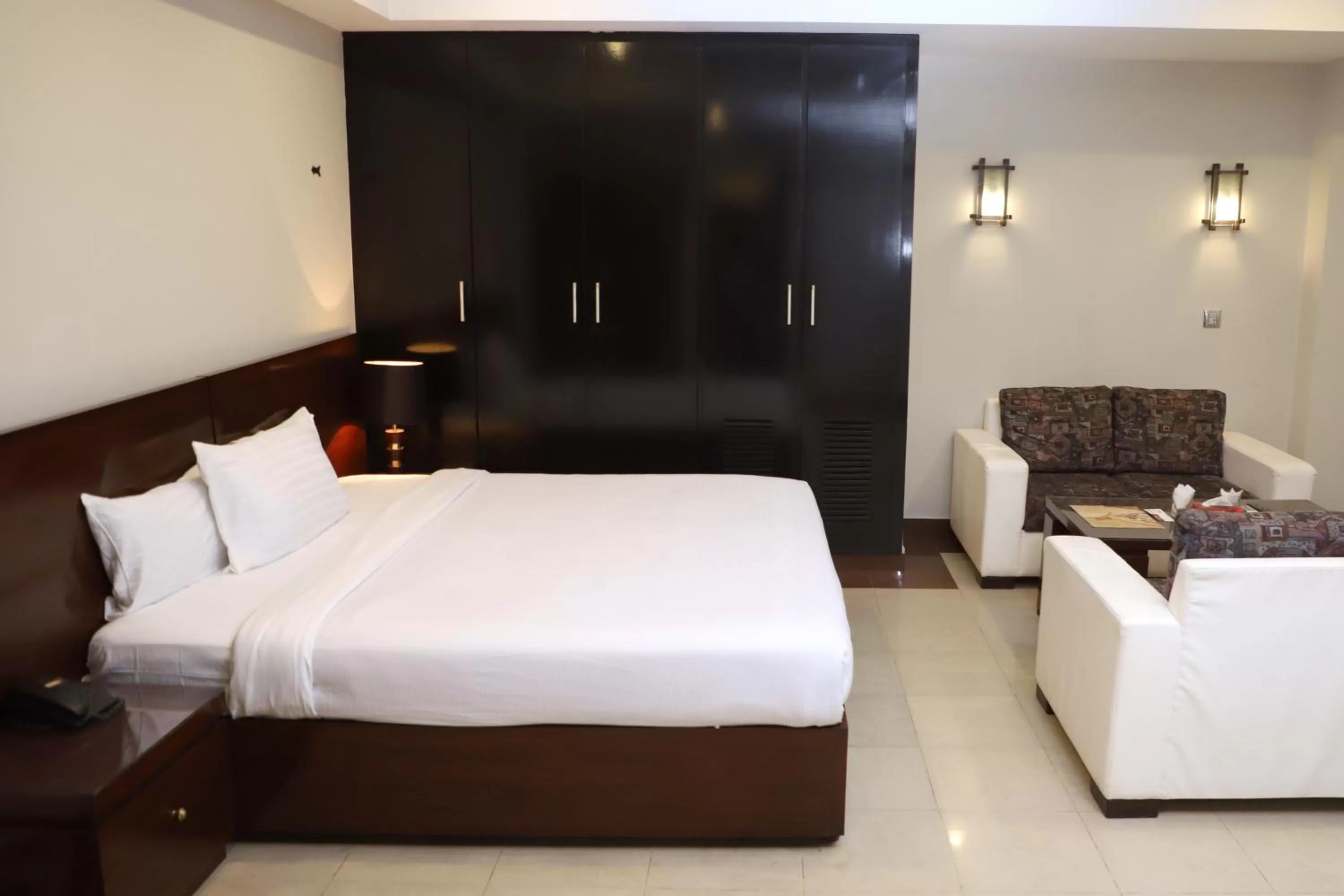 Bed in Hotel Multan Continental