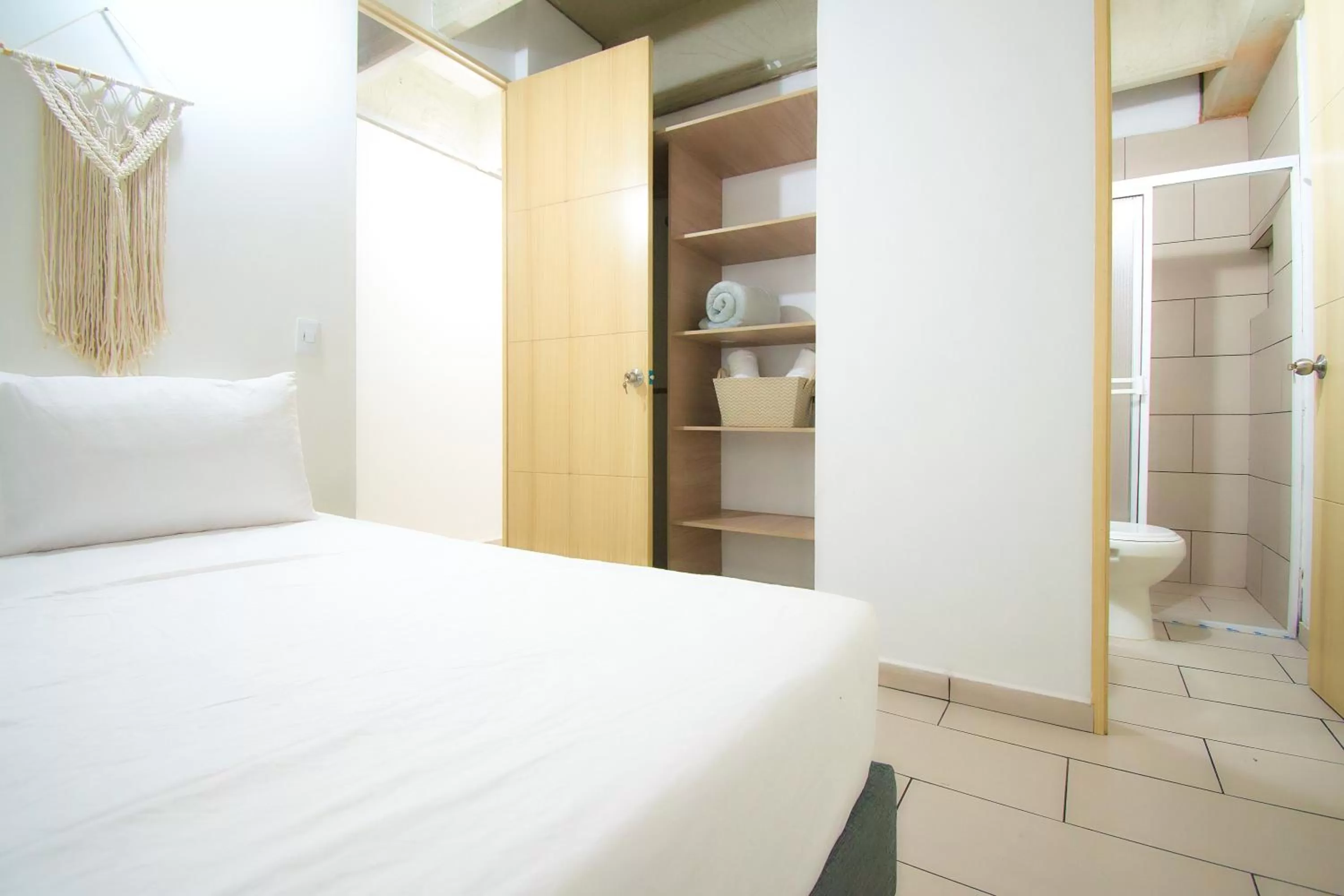 Bathroom, Bed in Mangata Living by Bernalo Hotels