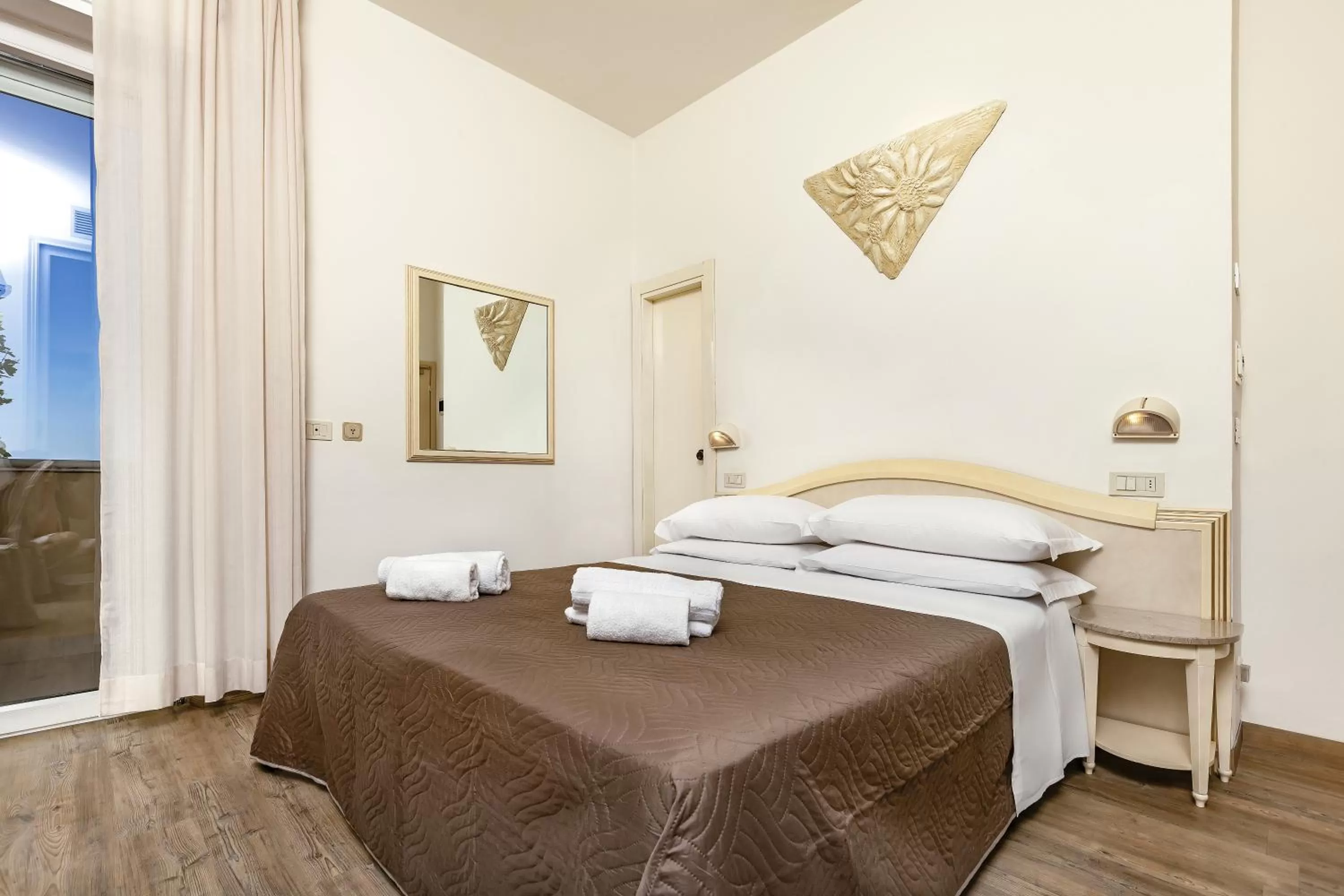 Bed in Ariminum Hotel