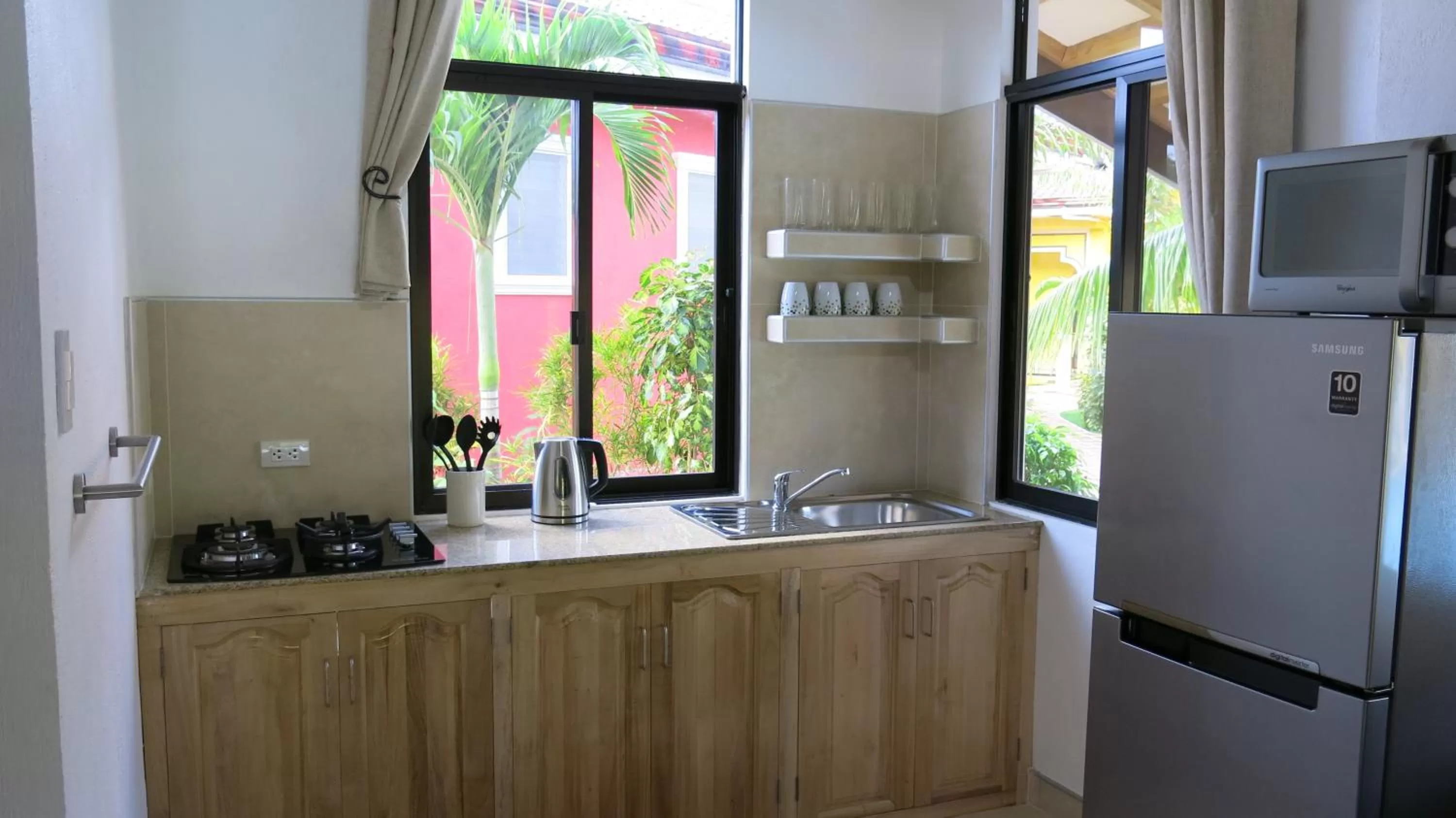 Kitchen or kitchenette, Kitchen/Kitchenette in Alona's Coral Garden Resort (Adult-Only)