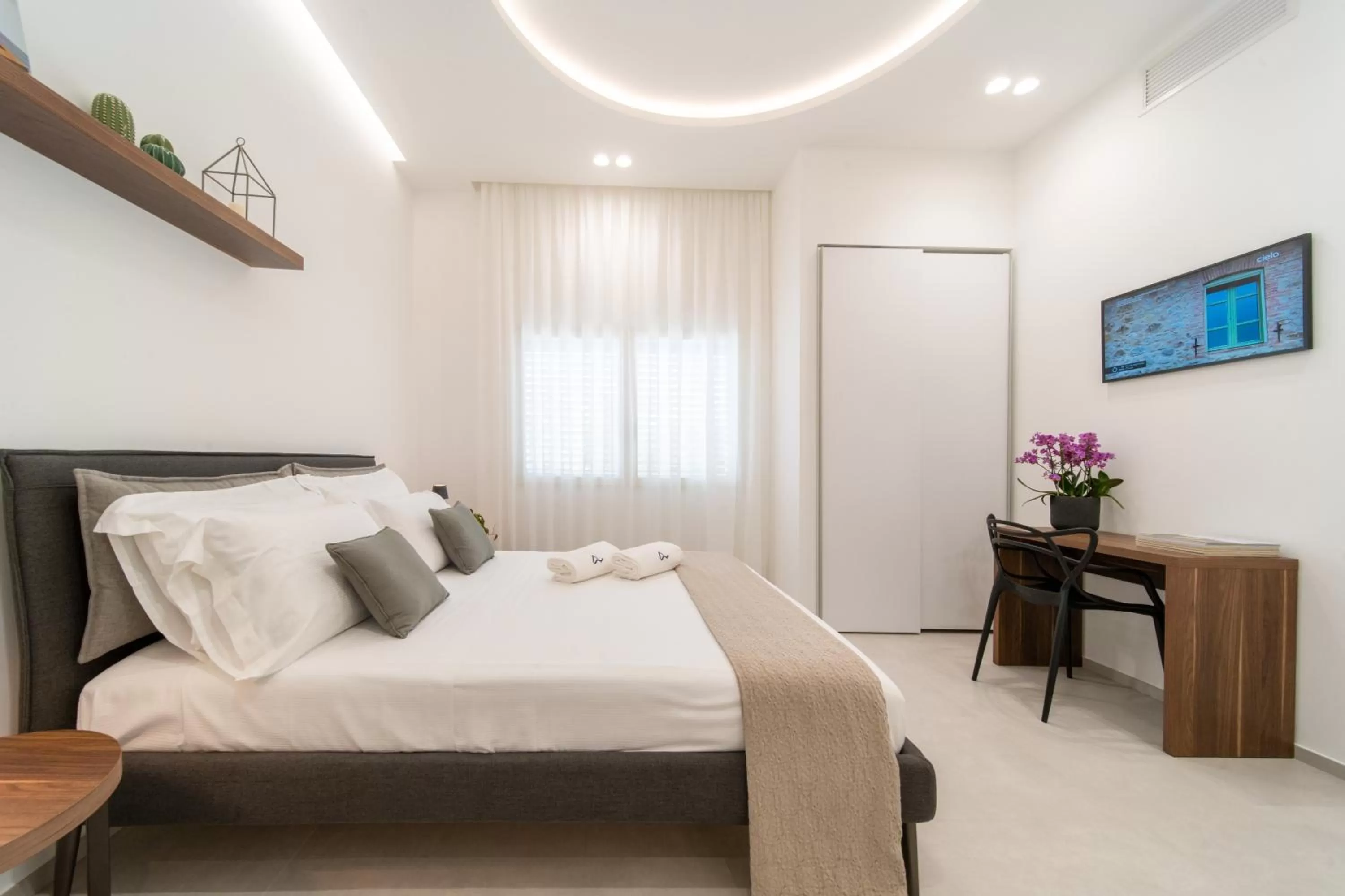 Bed in Daline Holiday Rooms