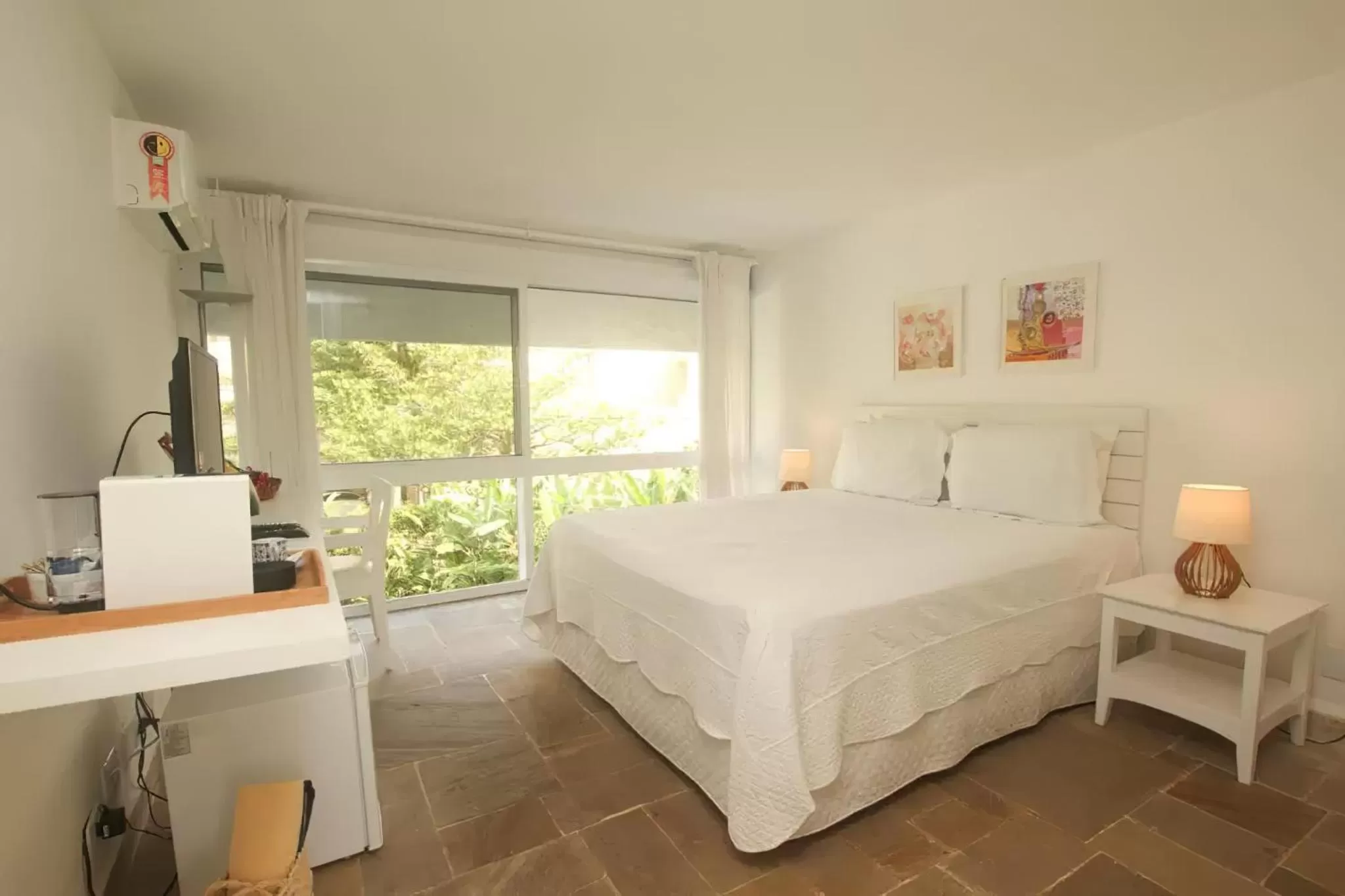 Bed in Guest House Guarujá