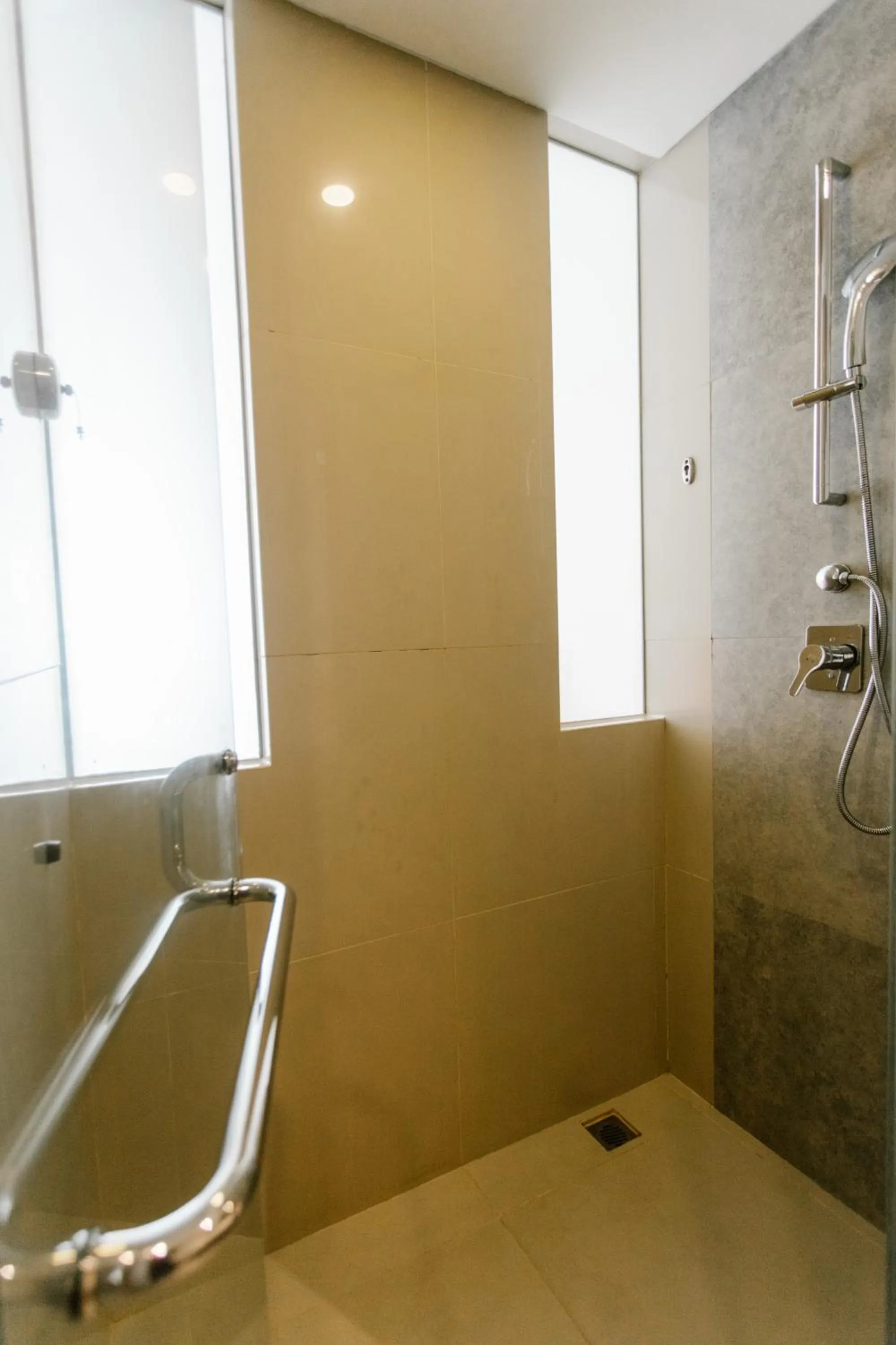 Bathroom in HARRIS Hotel Pontianak