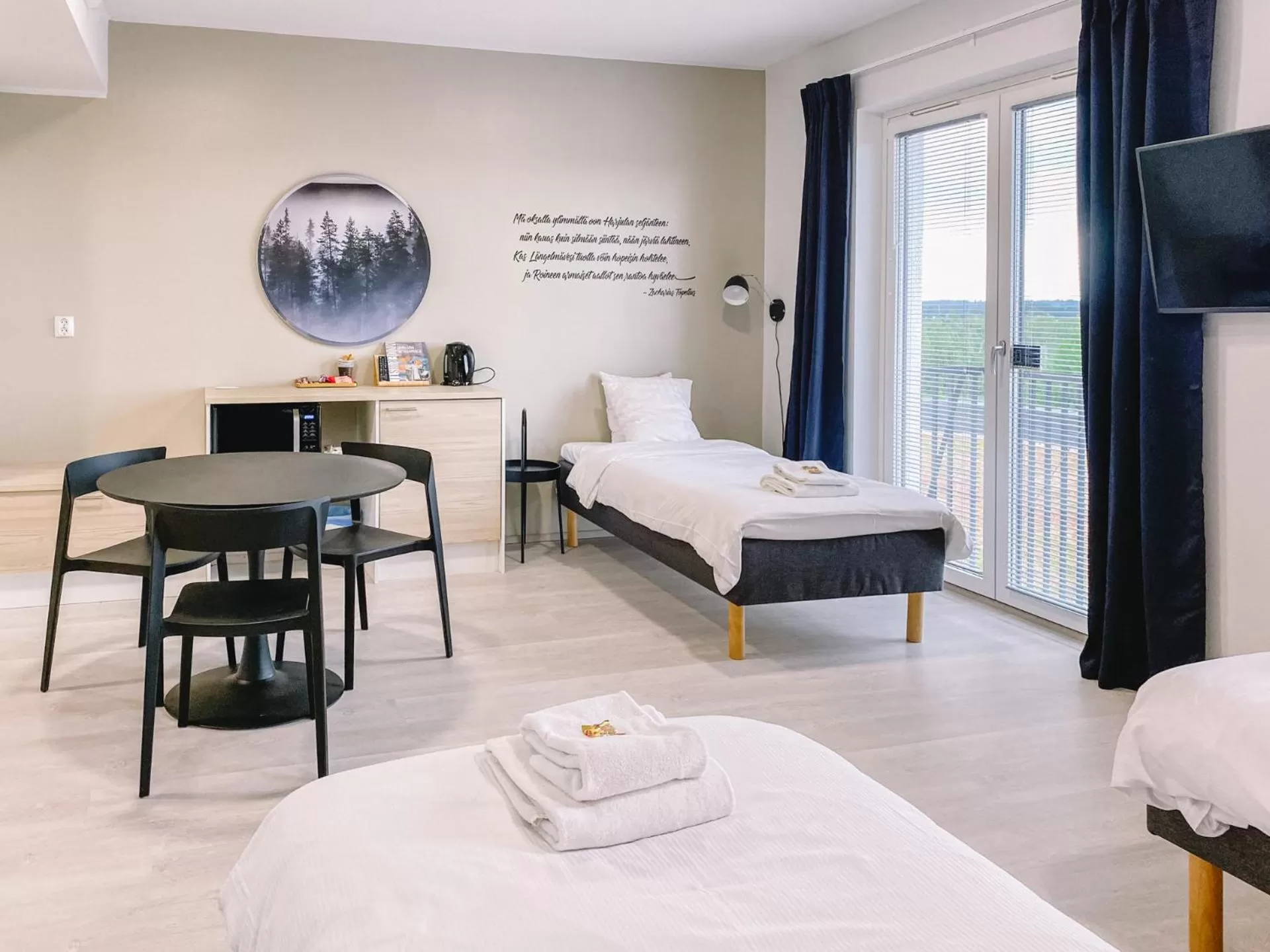 Bed in Hotelli Kuohu Kangasala - Hotel and Apartments by UHANDA