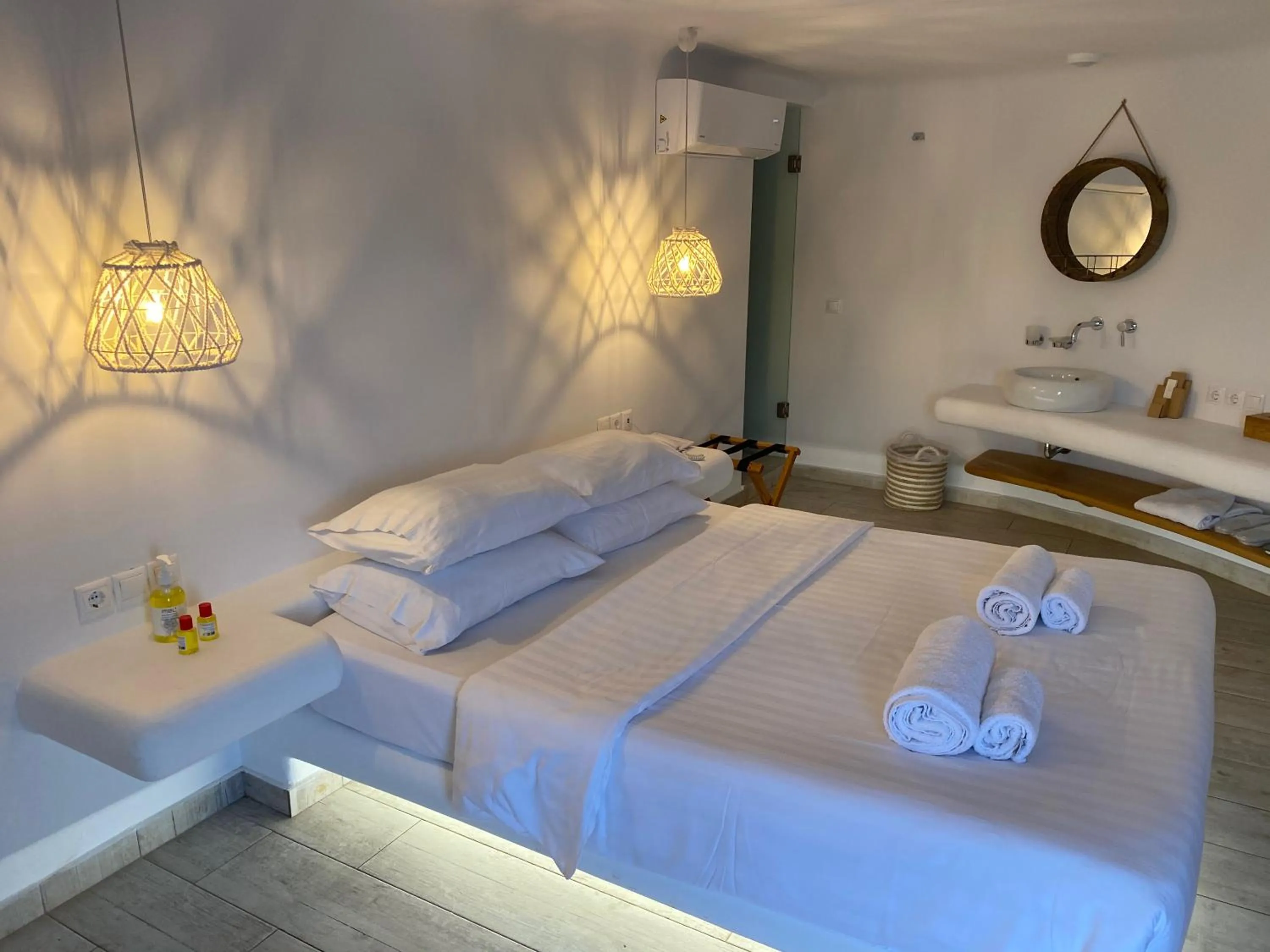 Patio, Bed in Panormos Village Hotel