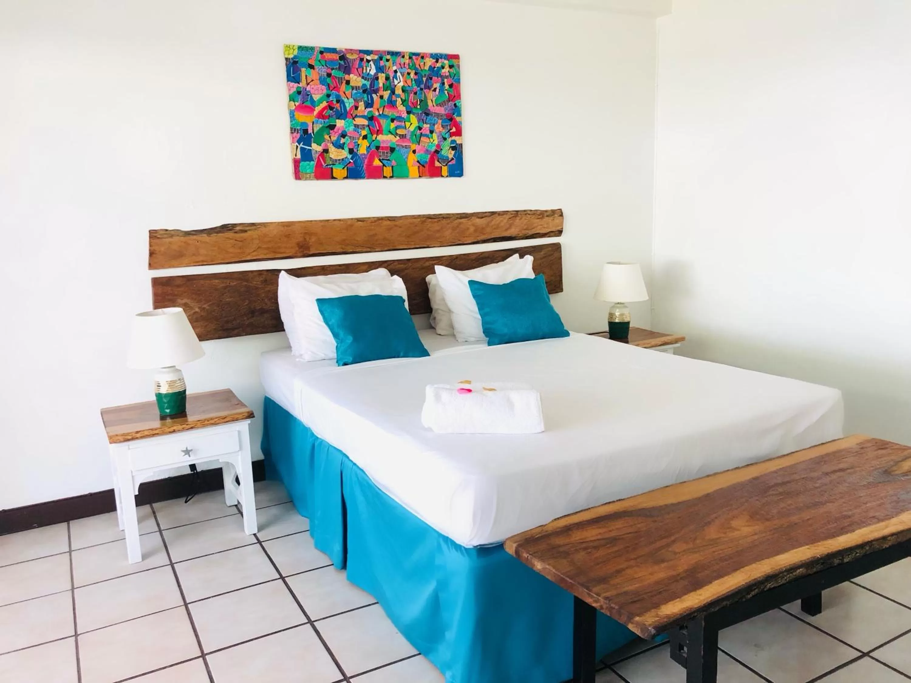 Bed in Sand and Tan Beach Hotel