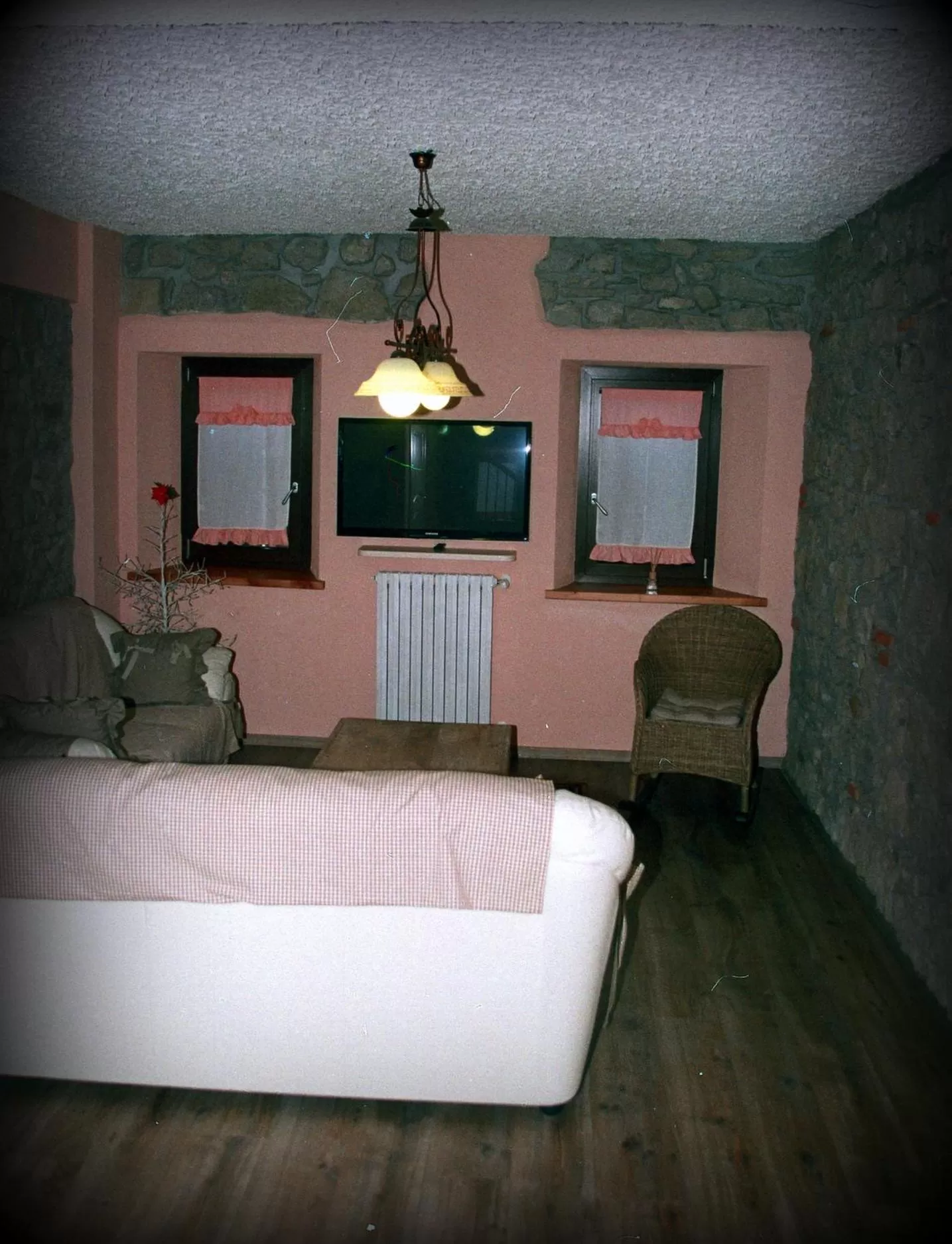 Communal lounge/ TV room in Locanda del Viandante