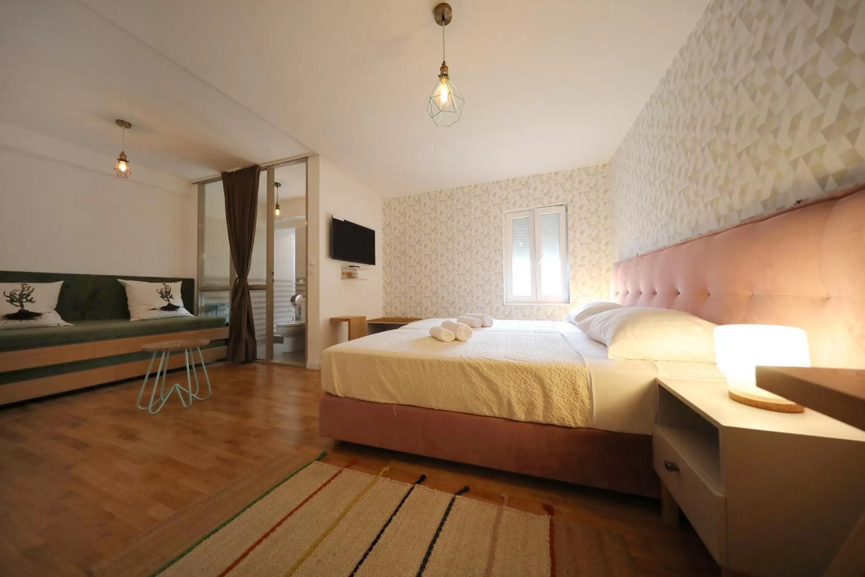 Bed in Central Apartments Integrated Hotel