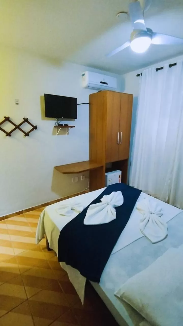 Bed in Pousada Do Suiá