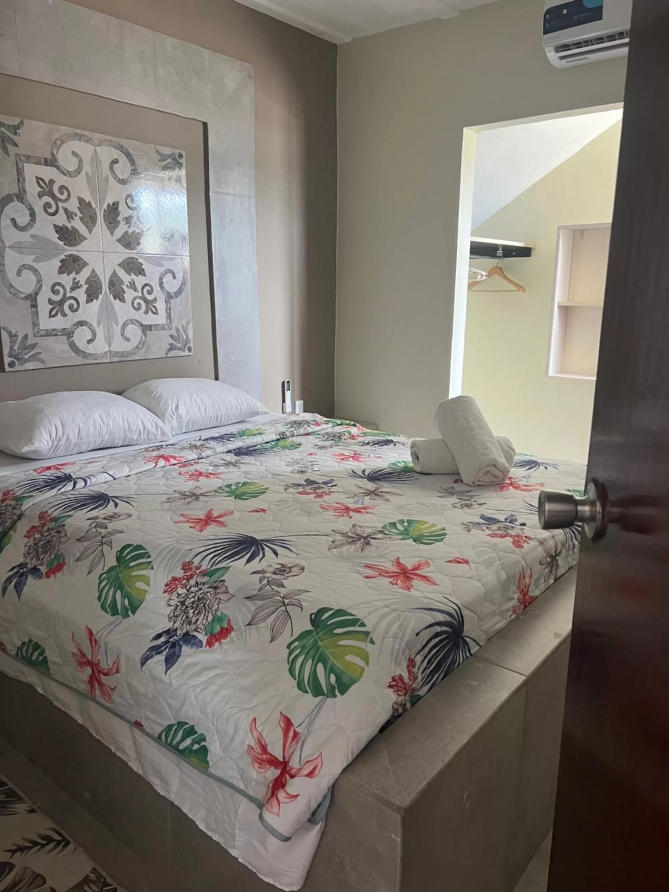 Bed in Curasita colour Appartments