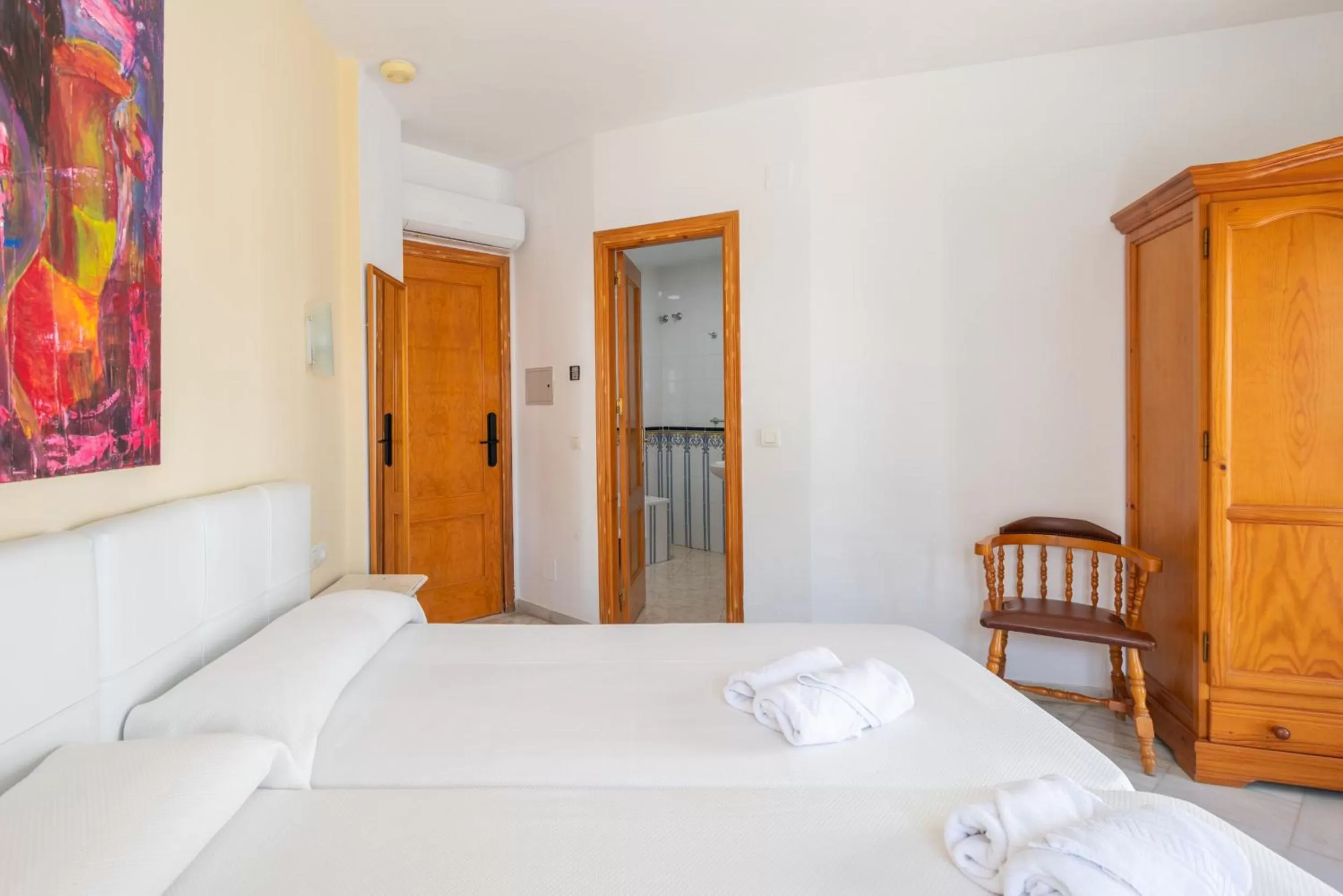 Bed in Apartahotel Playamaro by Dorobe