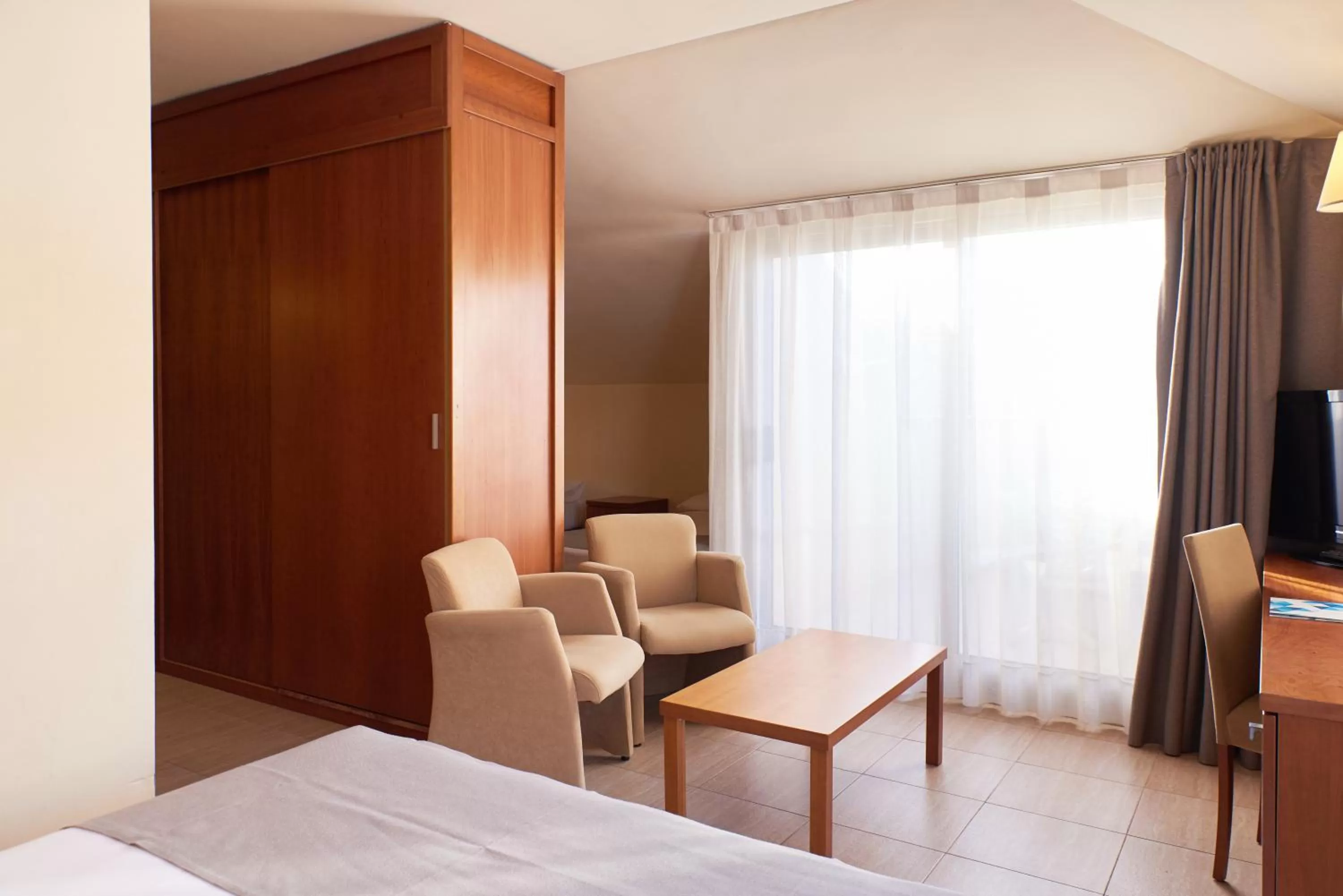 Seating area, Bed in DWO Sirius