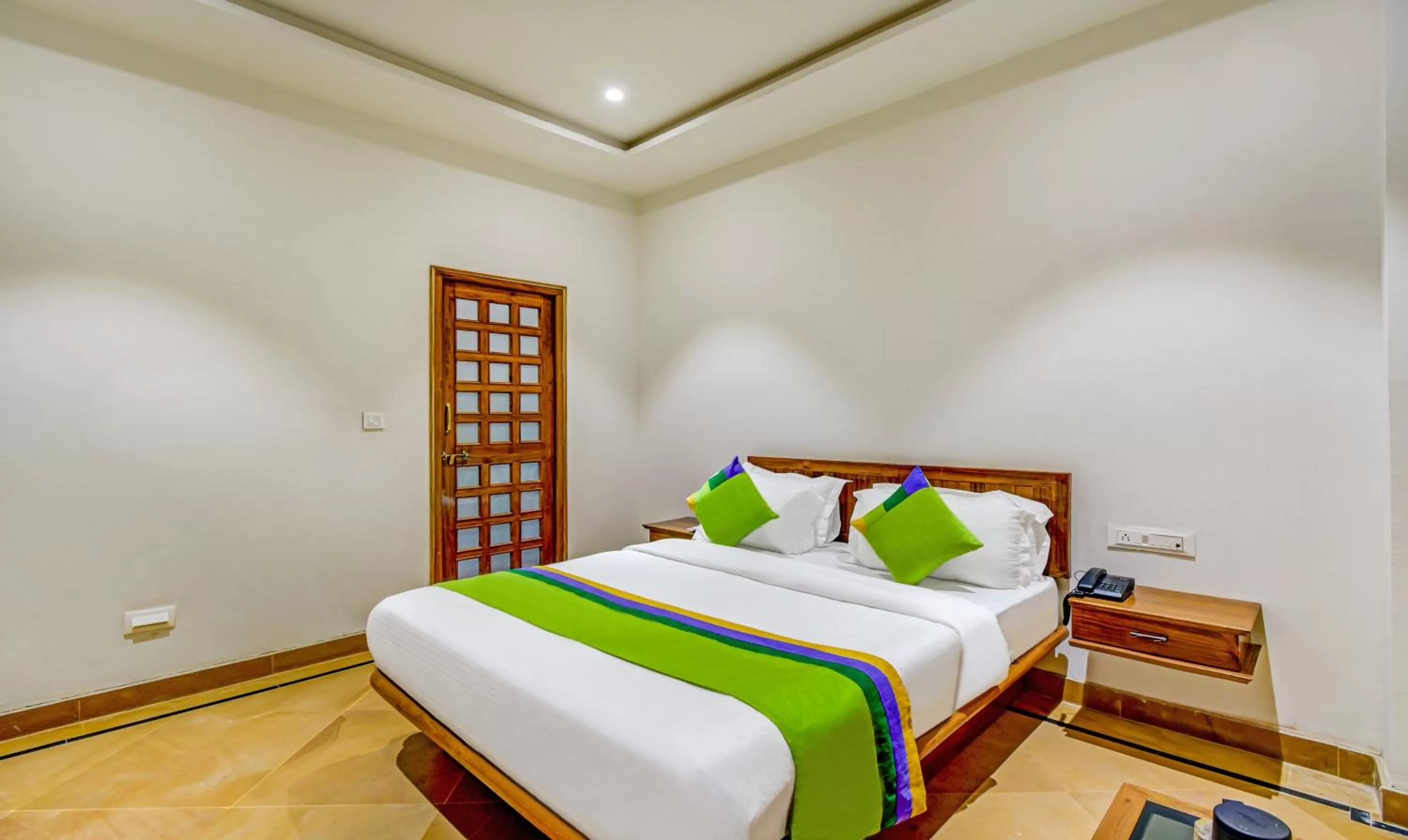 Bed in Treebo Trend Chandrangan Excellency