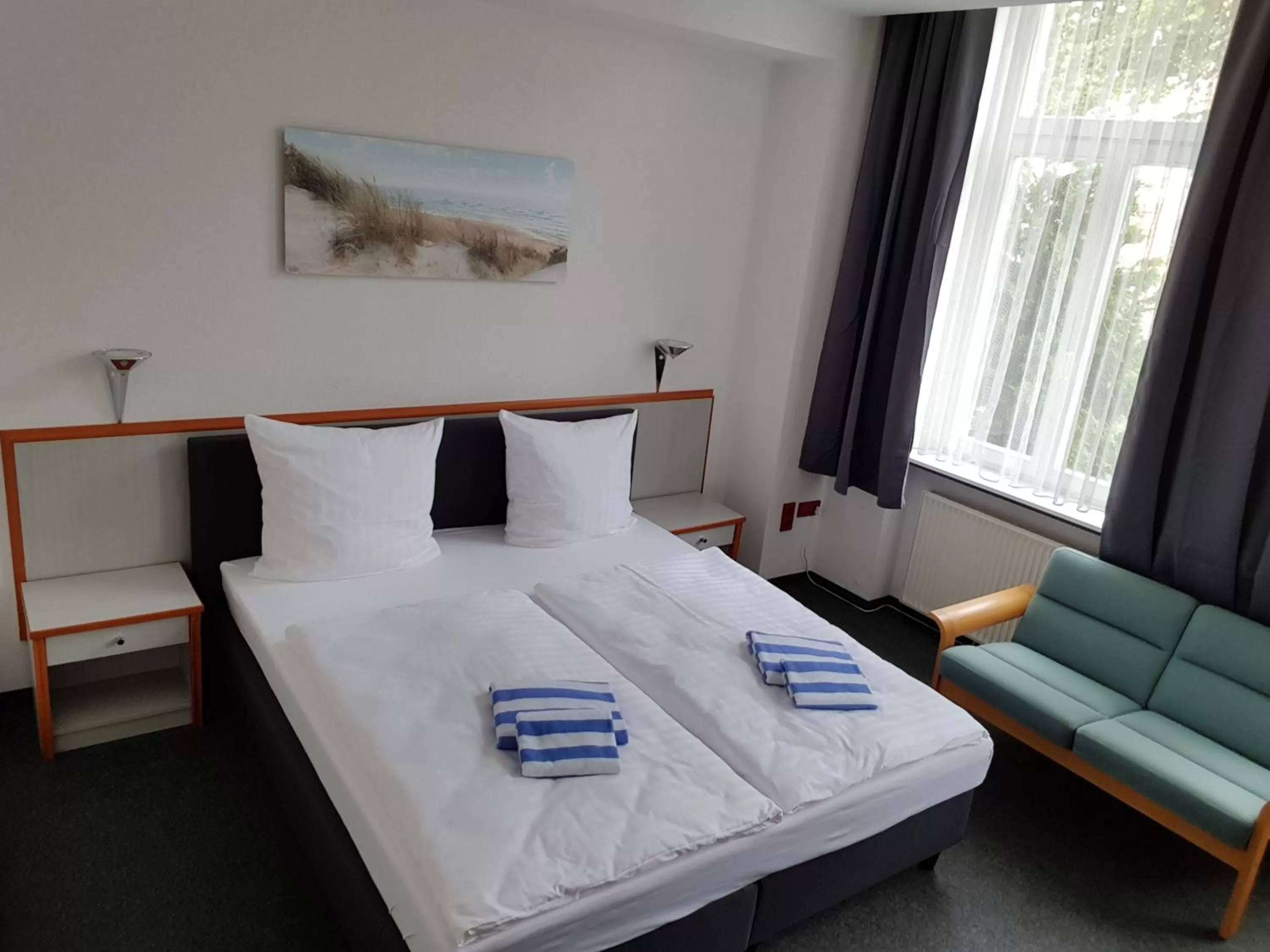 Bed in Appartement-Hotel Rostock