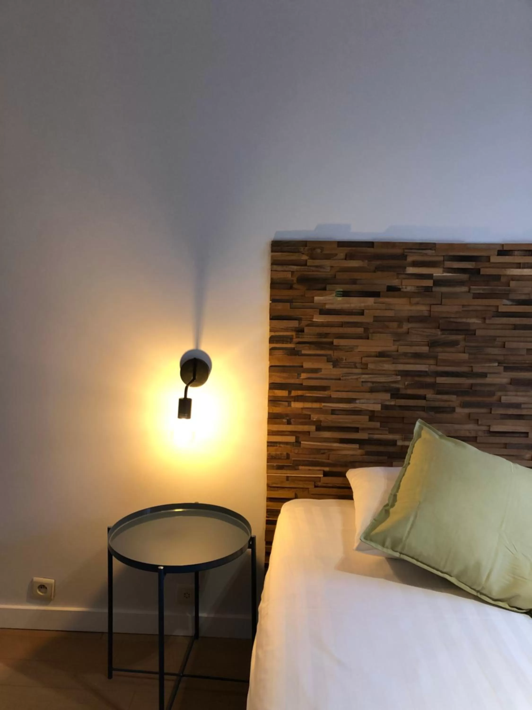 Bed in Hotel Le Cygne d'Argent