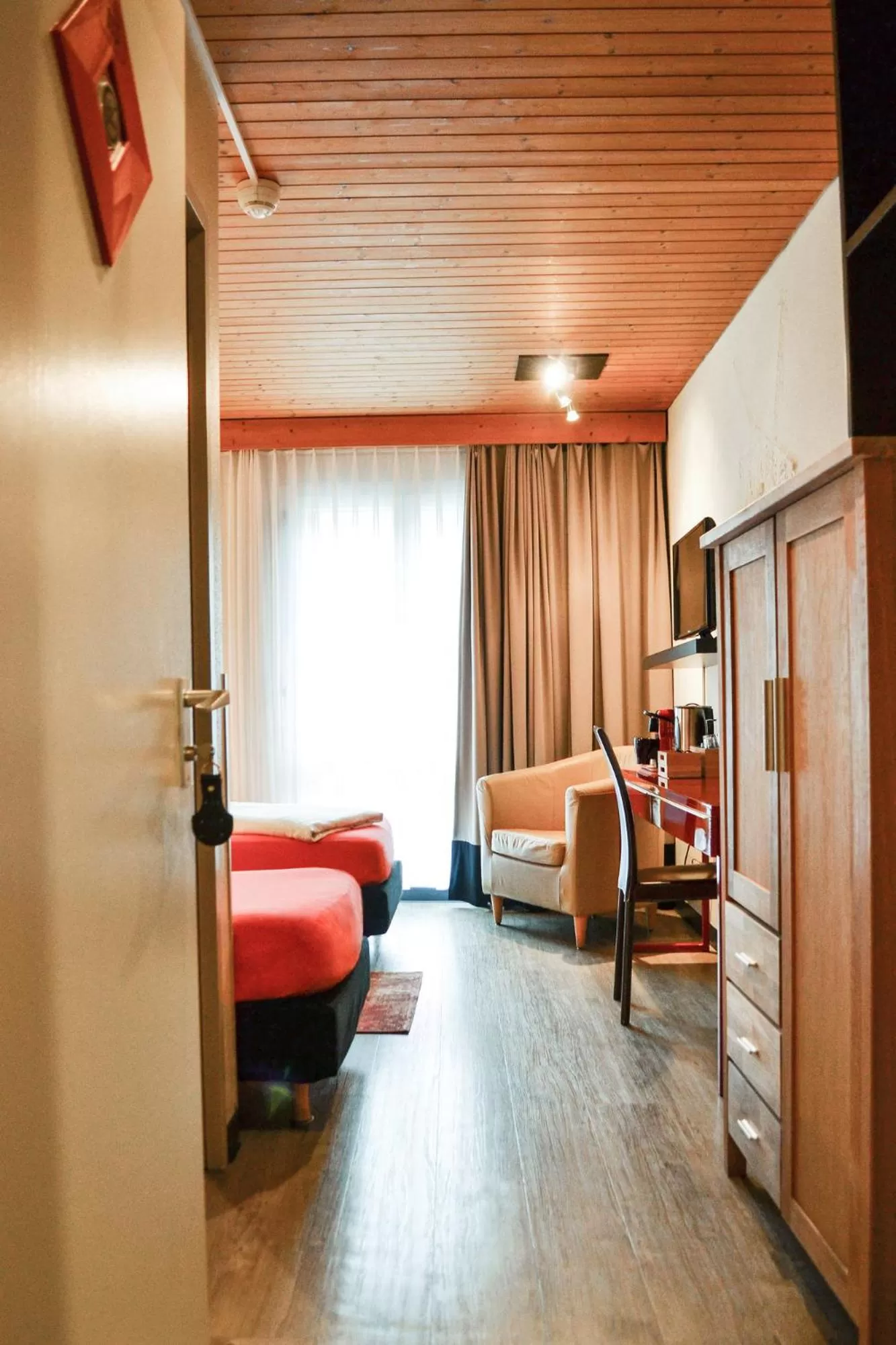 Photo of the whole room, Bed in Hotel Landhaus Säntis Herisau