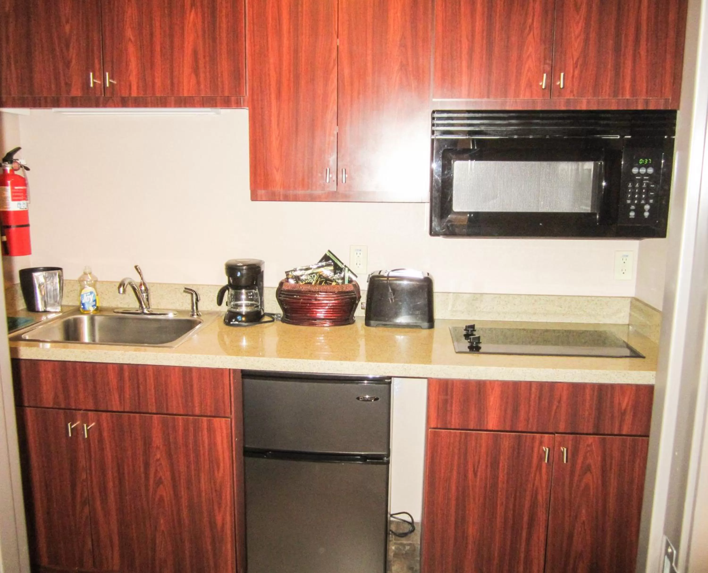 Kitchen or kitchenette in Bell's Extended Stay and Suites