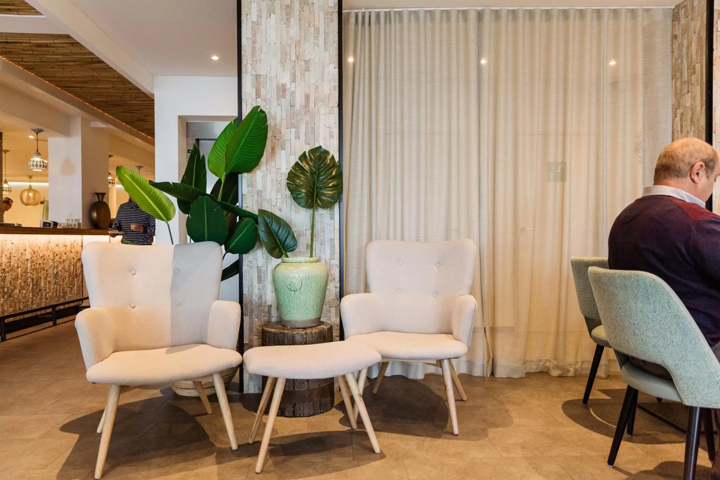 People in Beach Hotel Helios by CW Hotel Collection