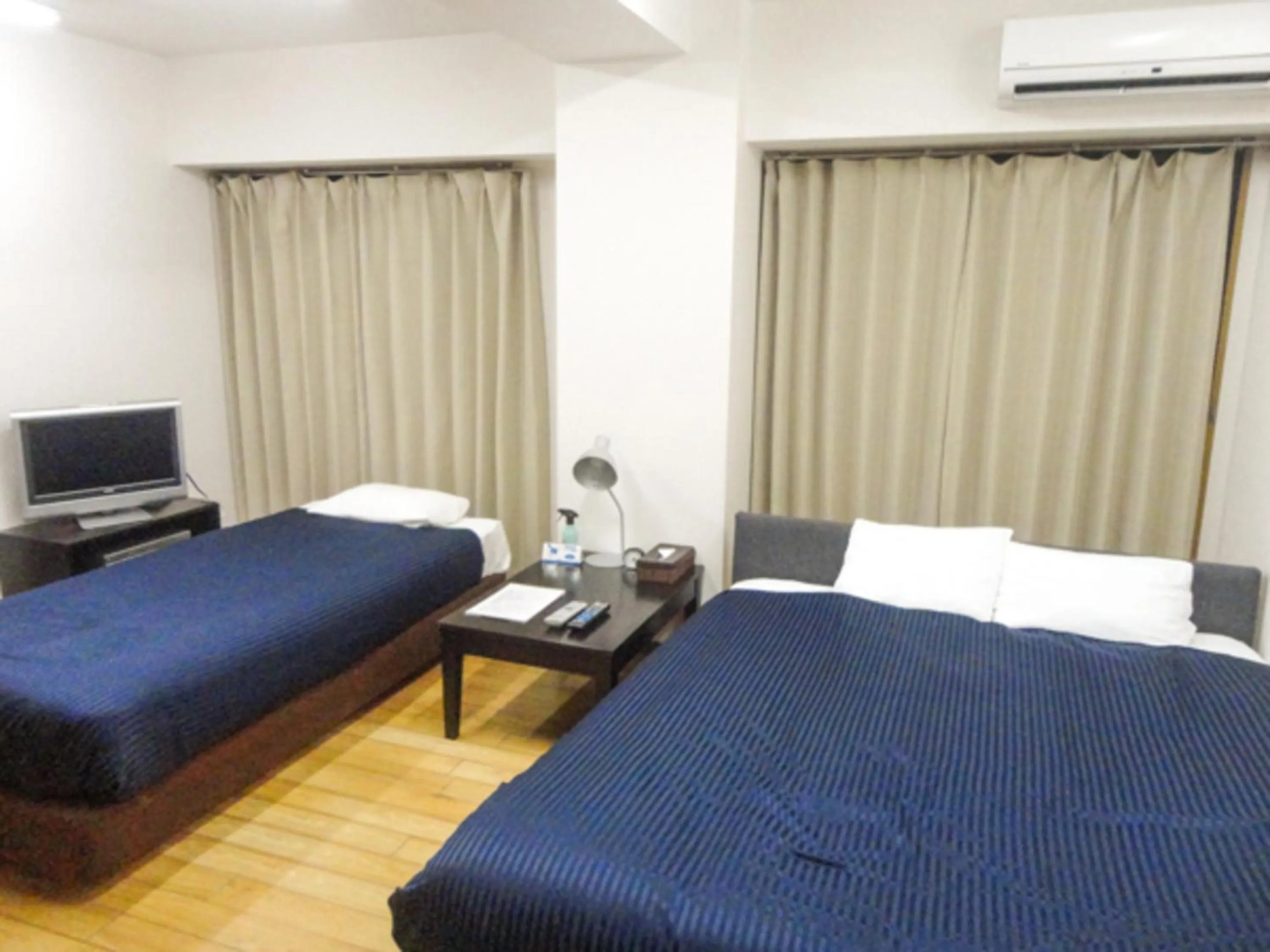 Bed in HOTEL LiVEMAX BUDGET Nagoya